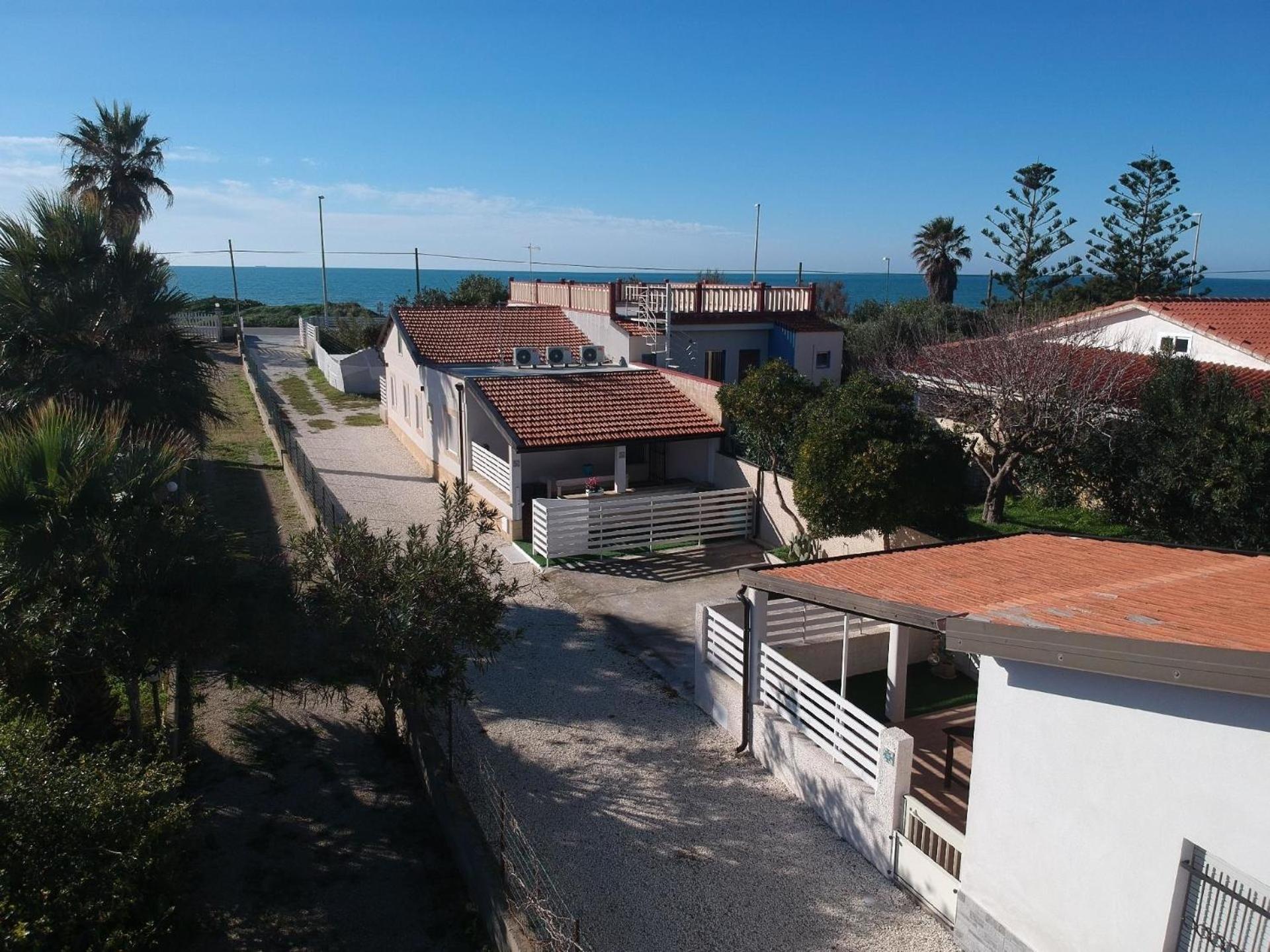 Edoné, Wohnung mit Blick auf einen Sandstrand
