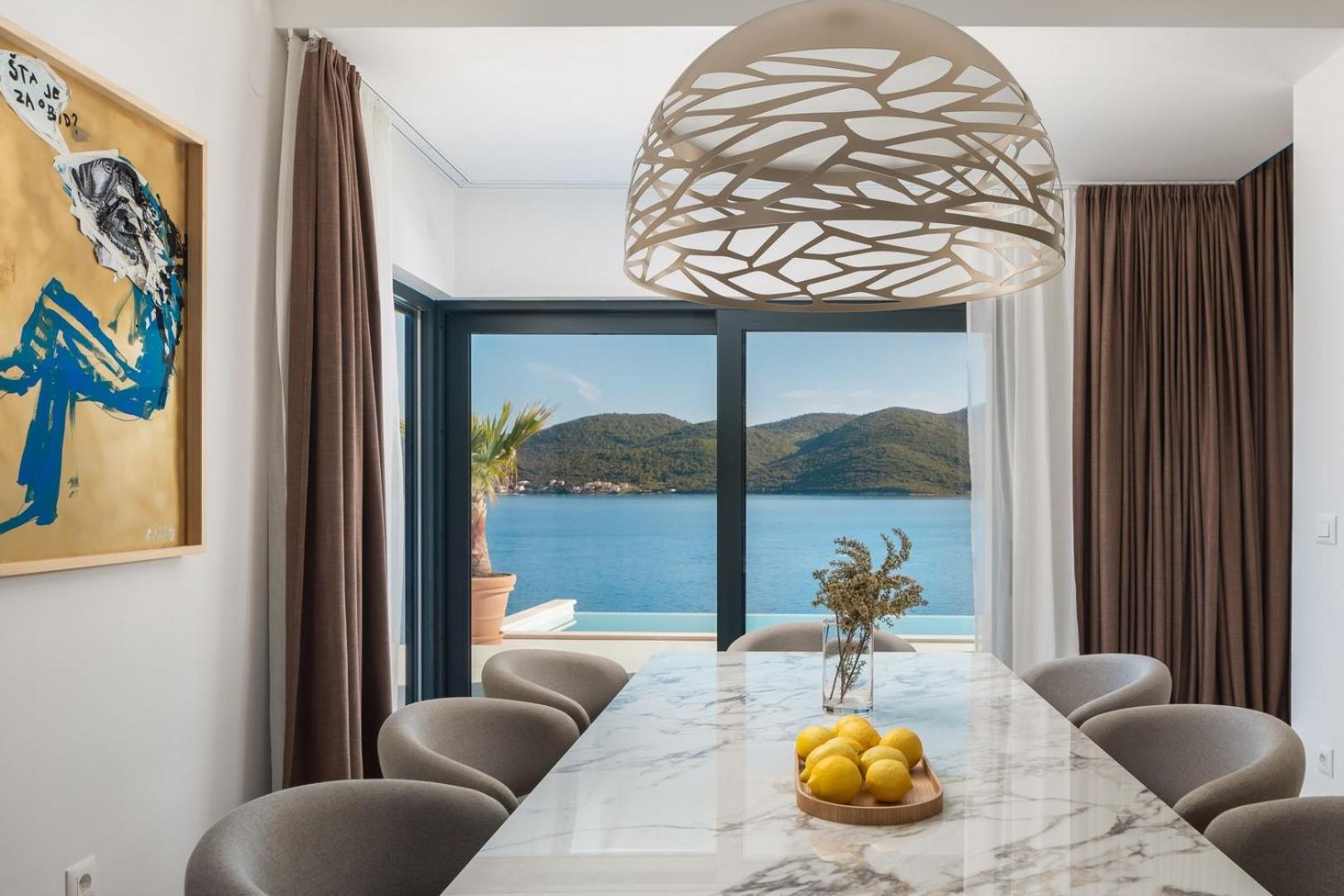 VILLA MARIS -heated pool,sauna,first row sea beach view 3