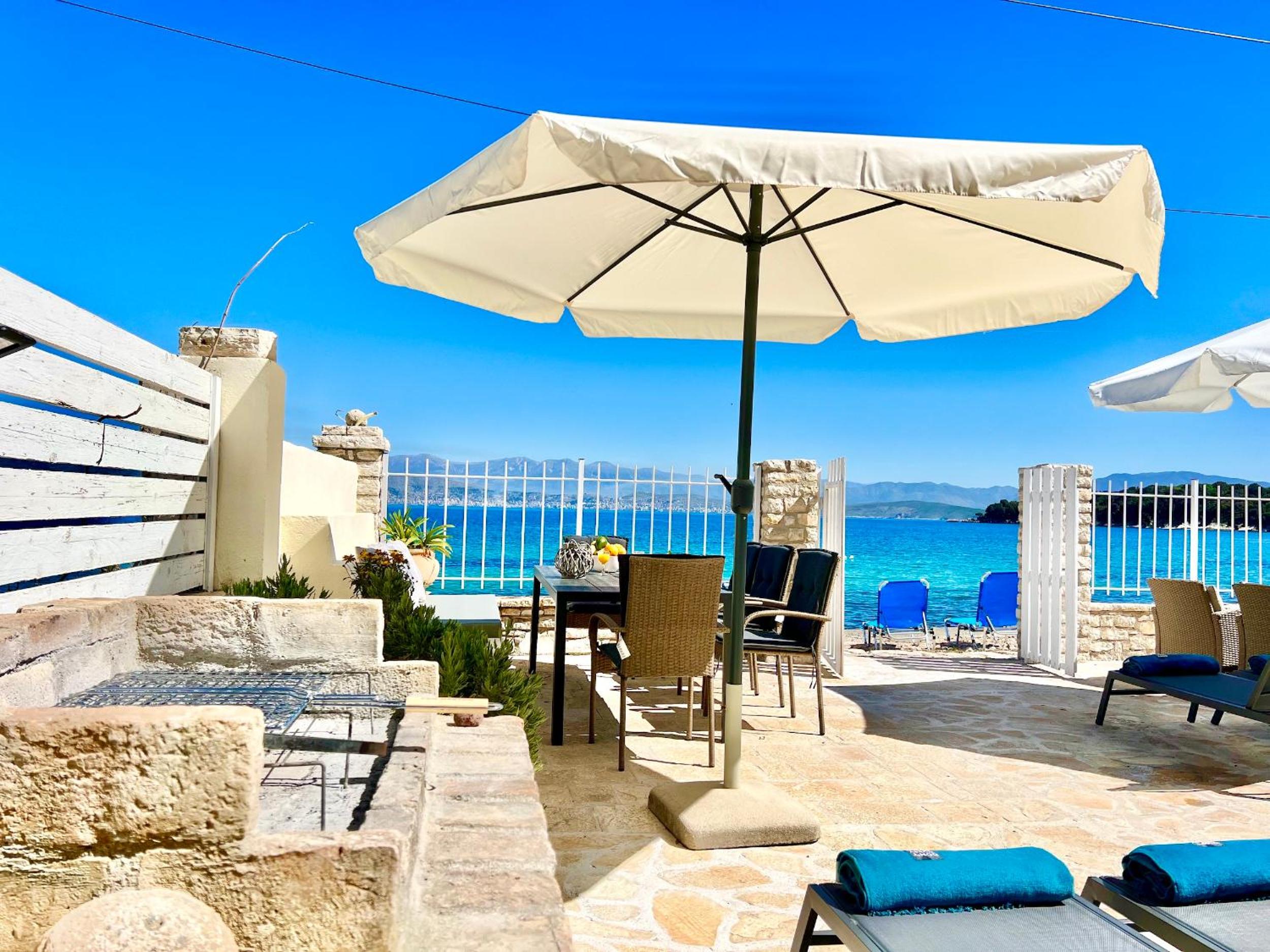 Beachfront House Christina with private heatable pool by DadoVillas view 2