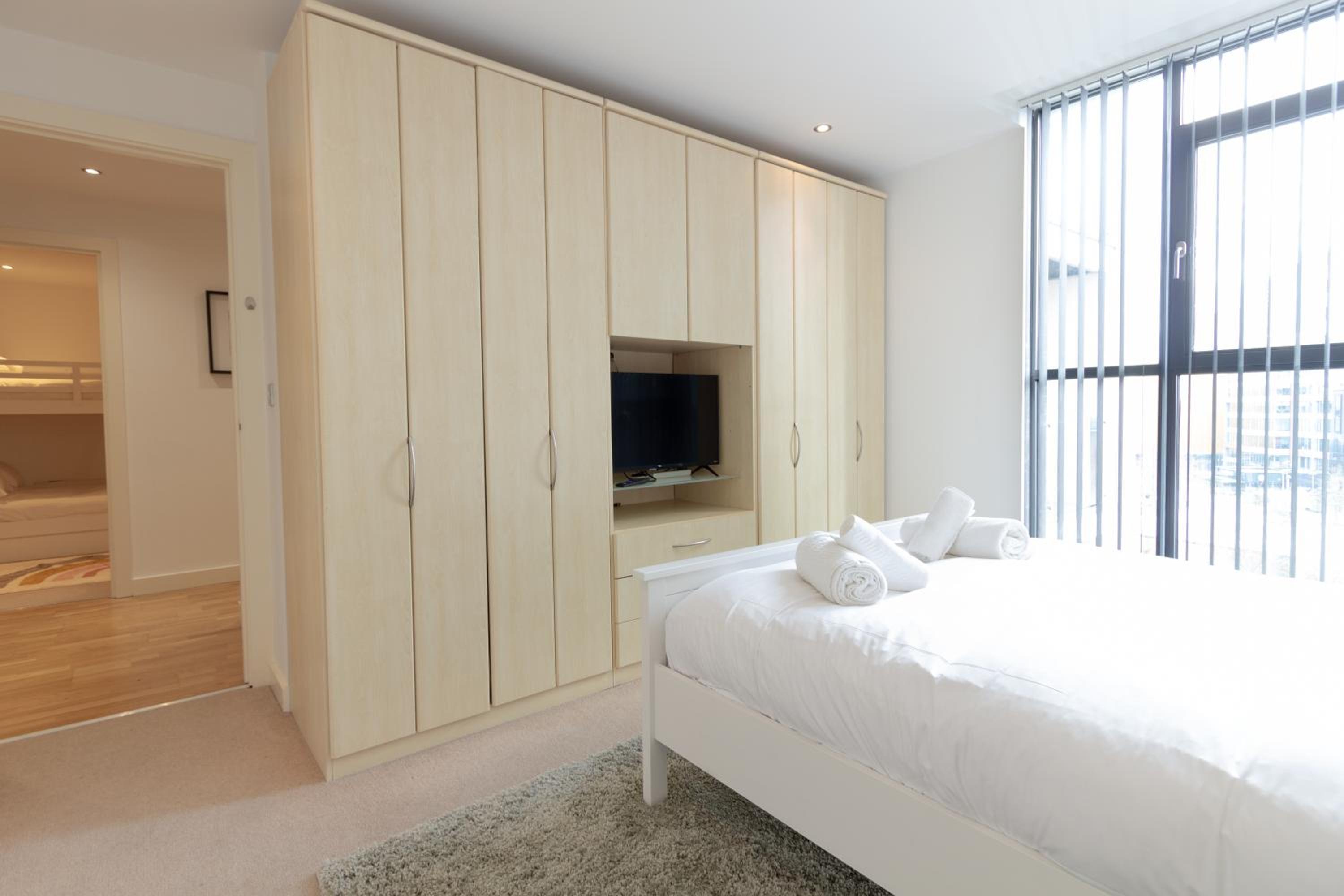 Central Gem: Cosy 2BR with Private Balcony view 4