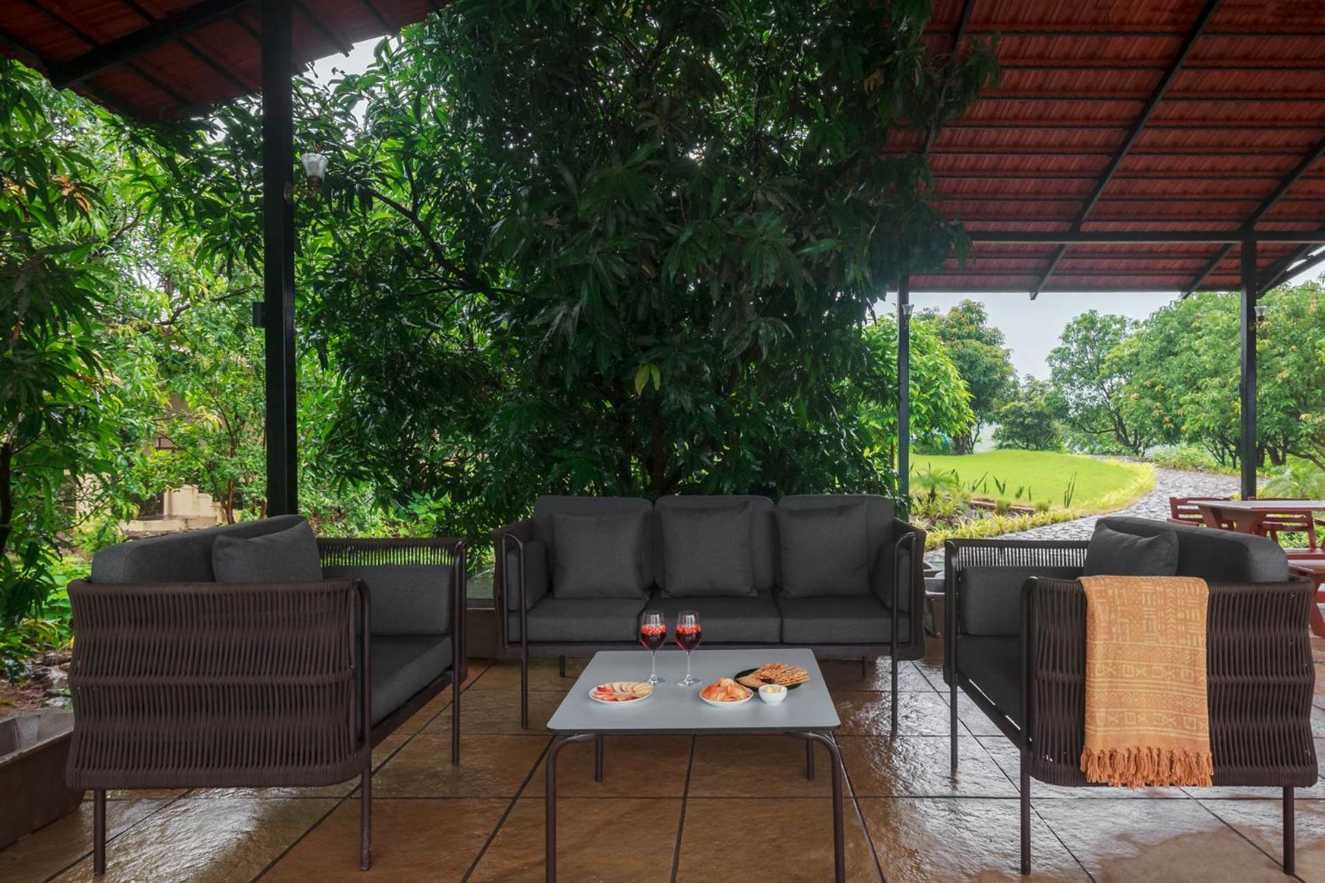 StayVista's Basalt - with Mountain Views, Infinity Pool, Vintage Interiors, and Games Room