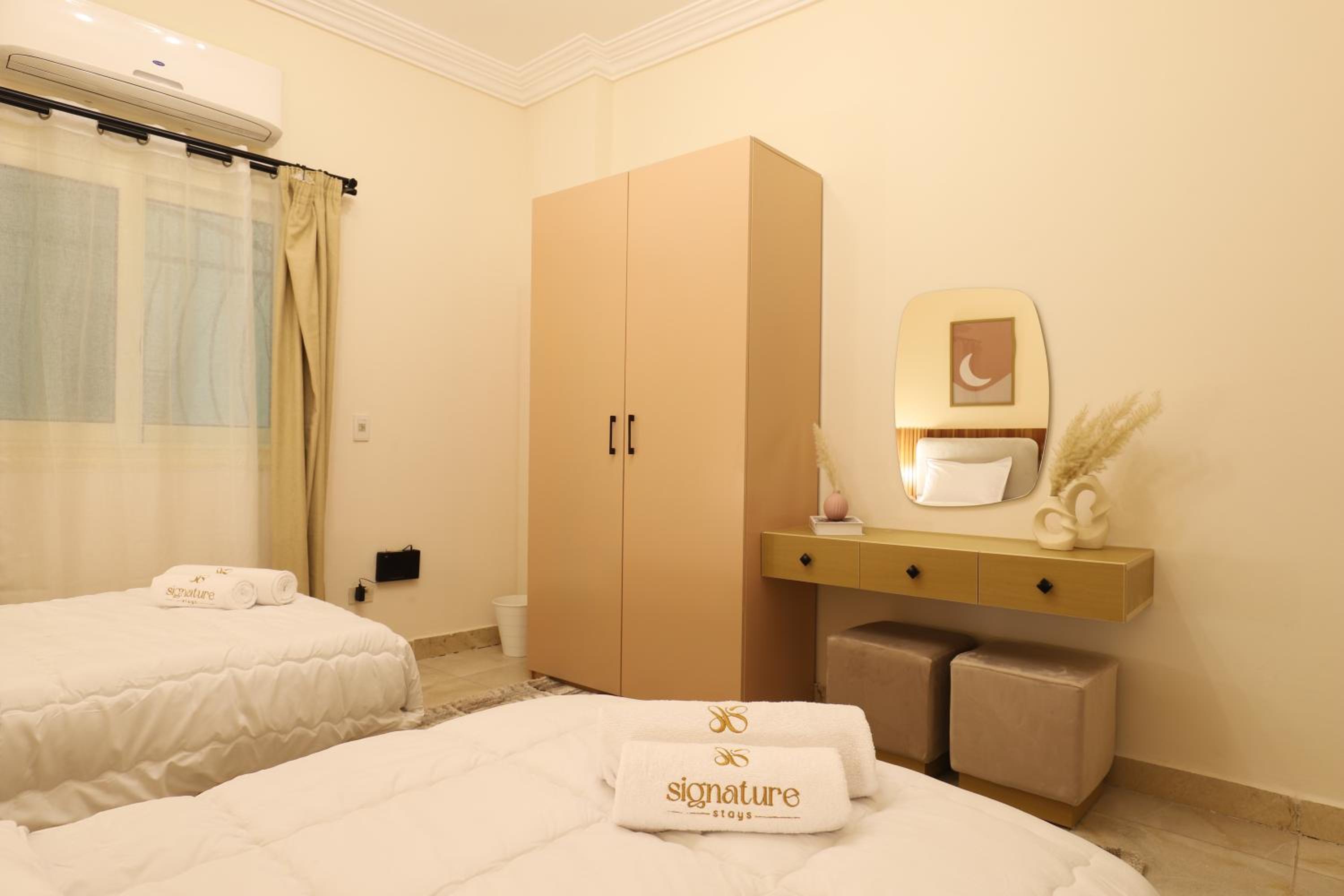 Signature Stays - Spacious Modern Apt