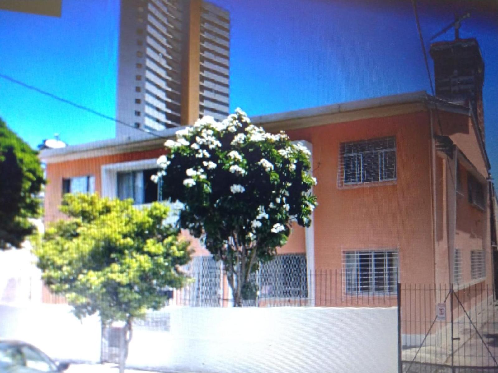 Quartos em apartamento rústico e aconchegante