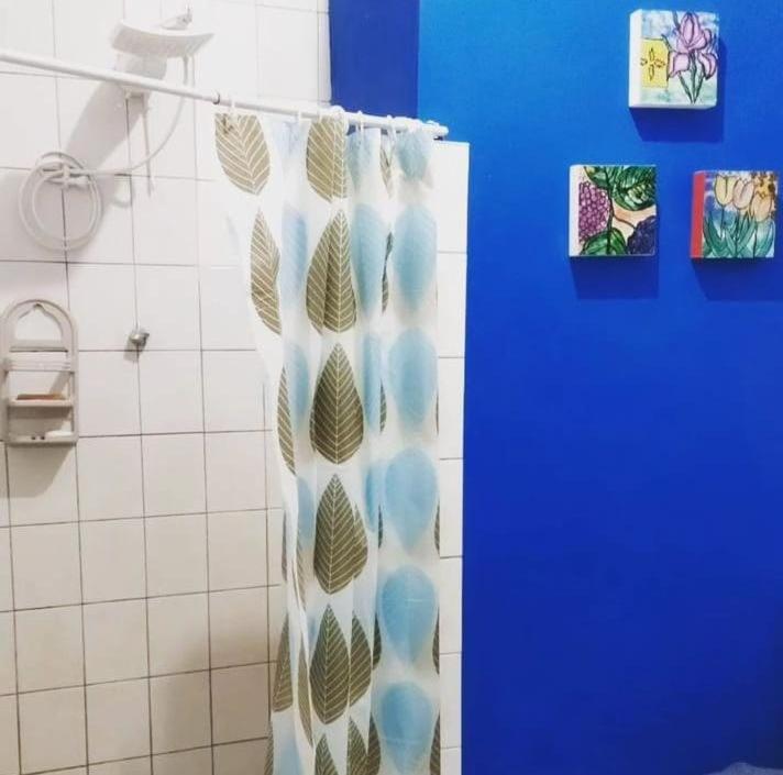 Quartos em apartamento rústico e aconchegante
