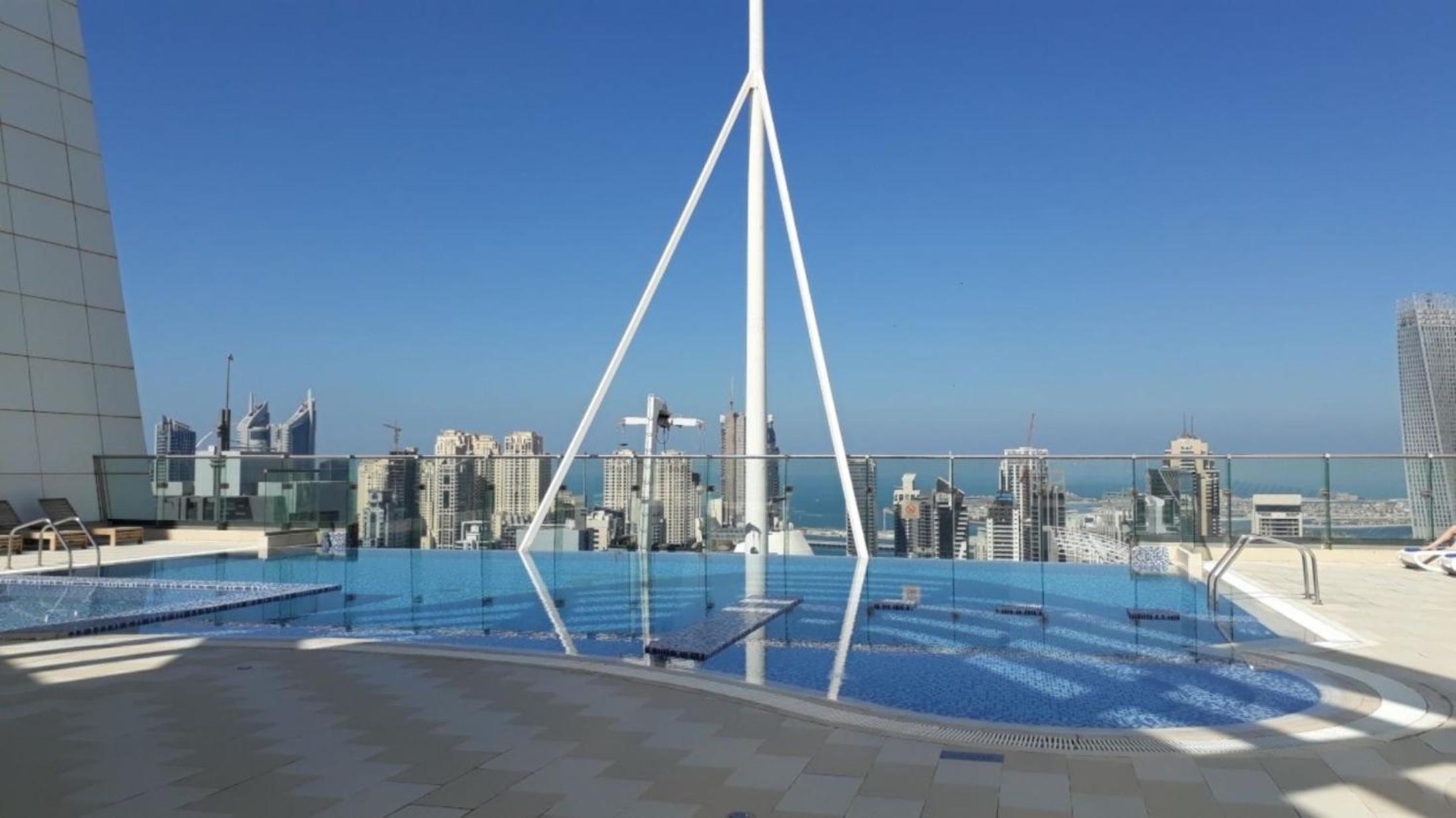 Click Stay - JLT - Studio & Balcony Lakes view Entire Apartment -RA