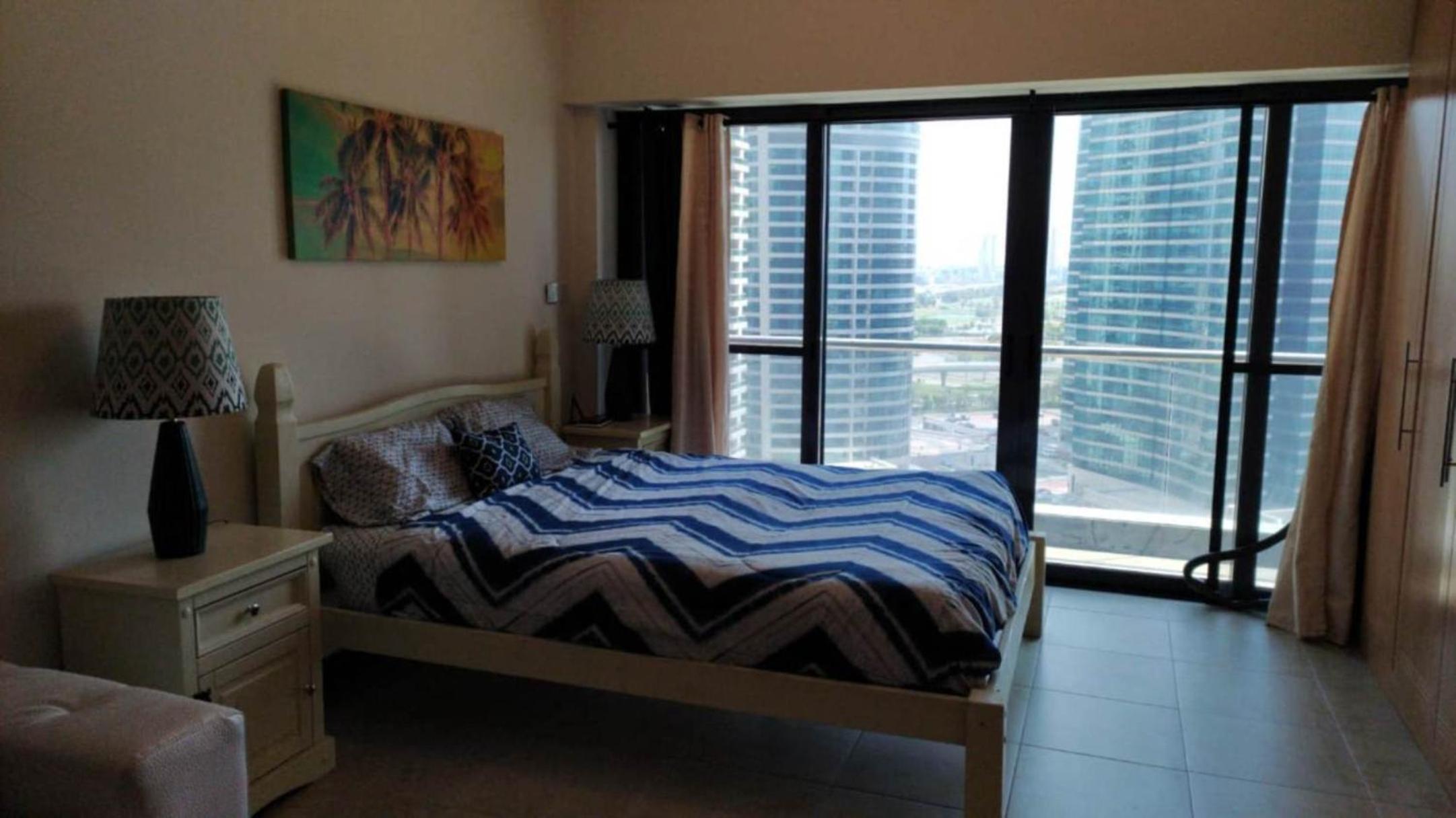 Click Stay - JLT - Entire Studio & Balcony Lakes view Apartment -AM
