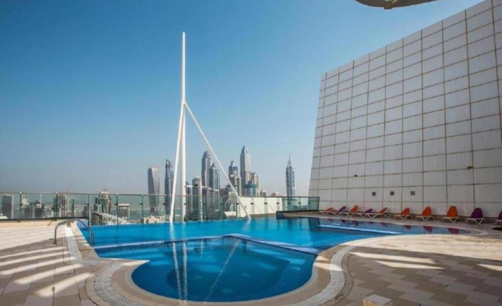 Click Stay - JLT - Entire Studio & Balcony Lakes view Apartment -NA