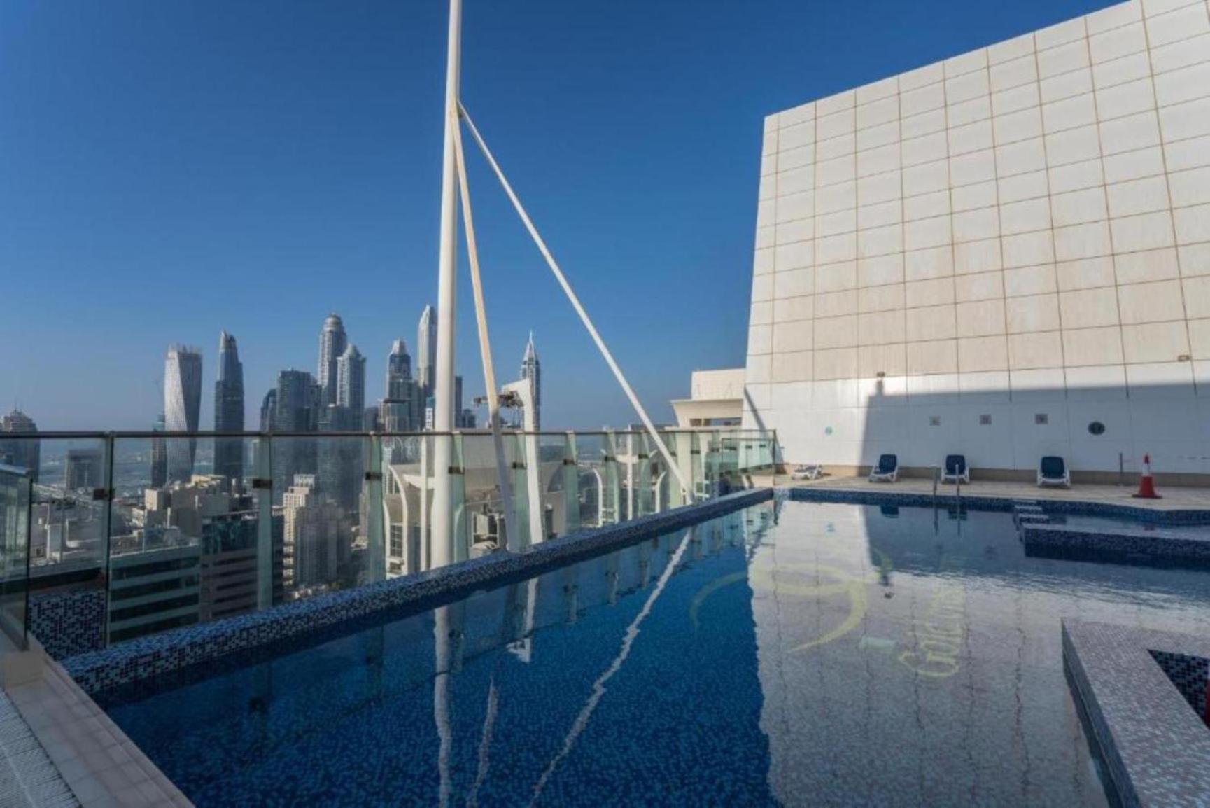 Click Stay - JLT - Entire Studio & Balcony Lakes view Apartment -NA