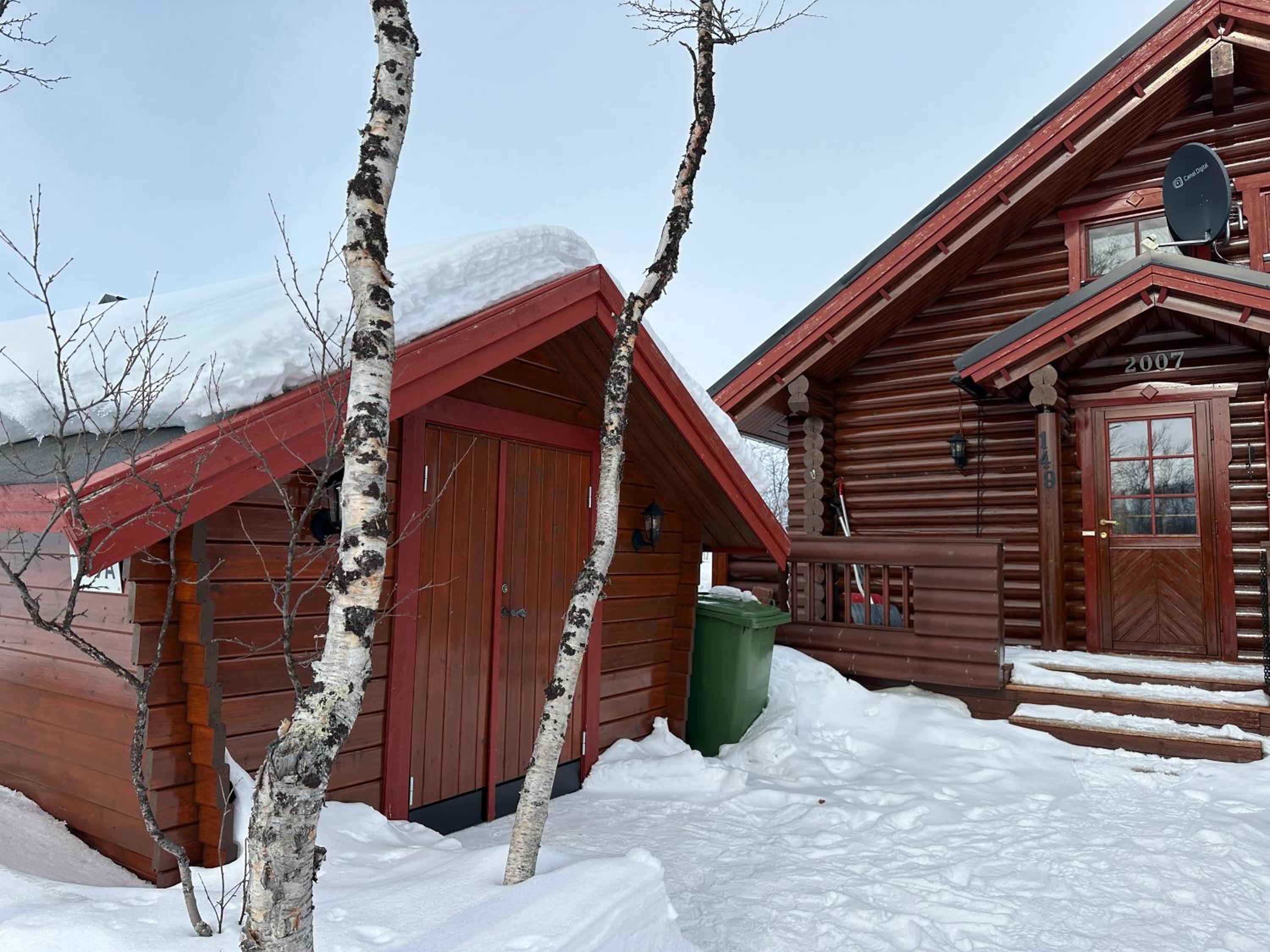 Koslig tømmerhytte