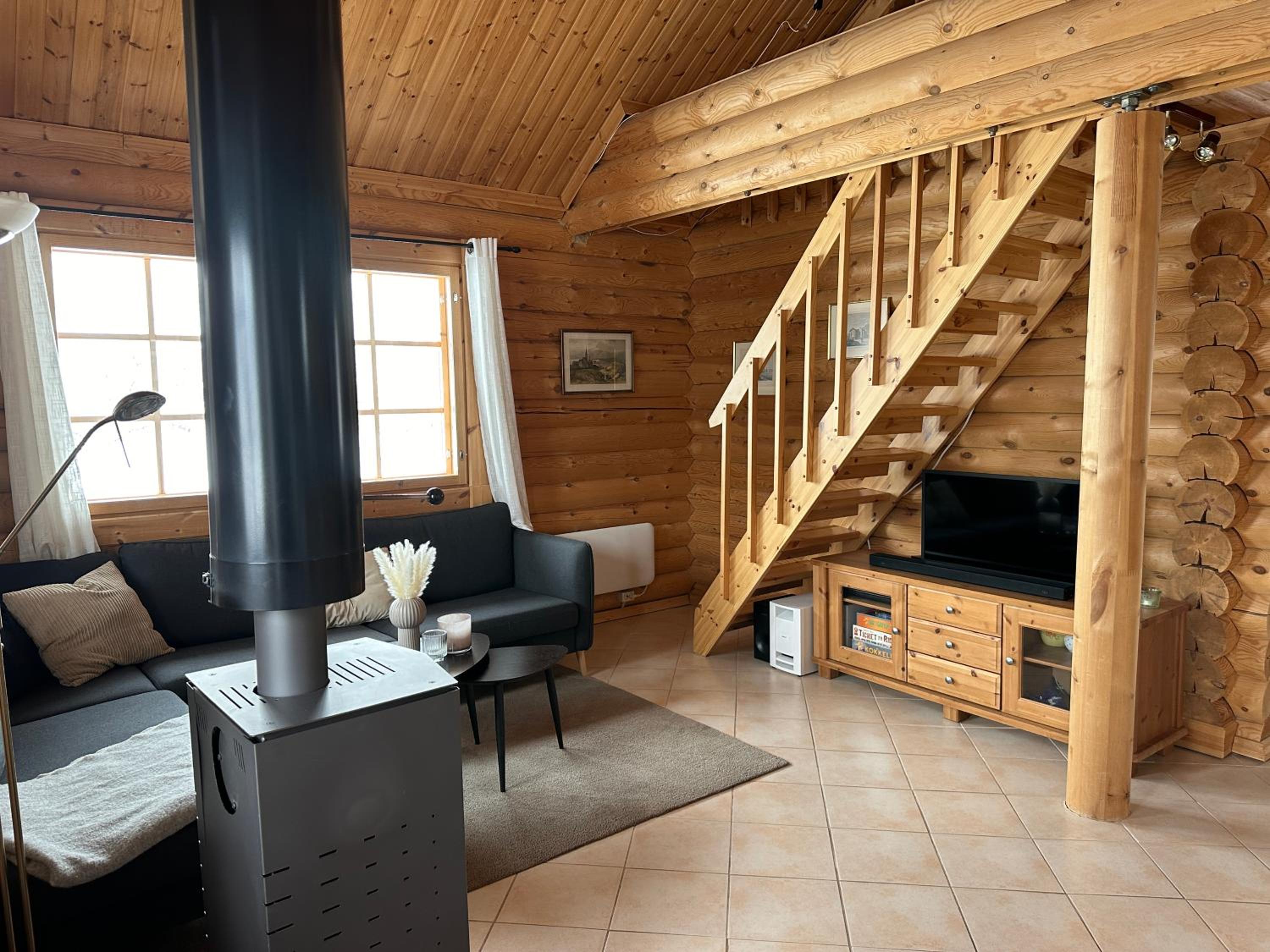 Koslig tømmerhytte