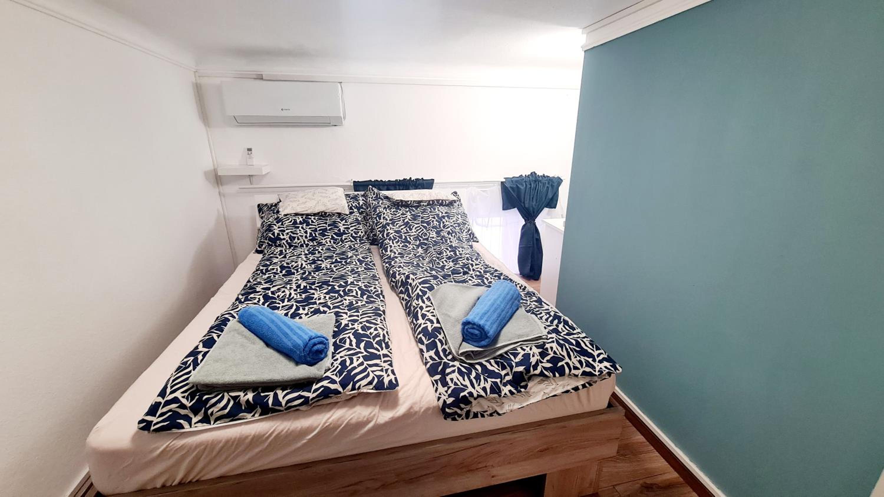 2 separate bedrooms and living room fully equipped with AC