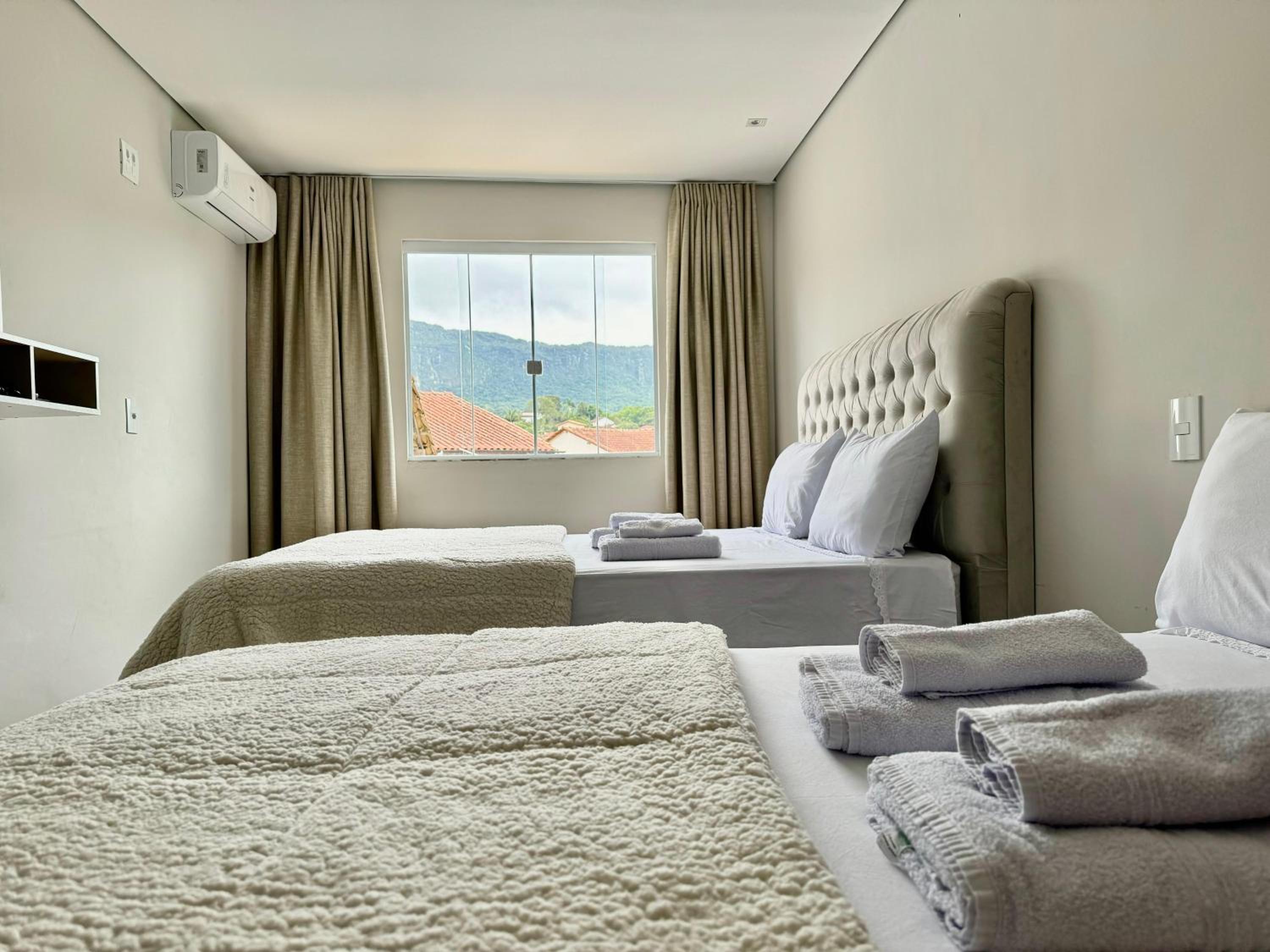 Apartamentos a 200m do centro - Hospedaria Villa da Pedra