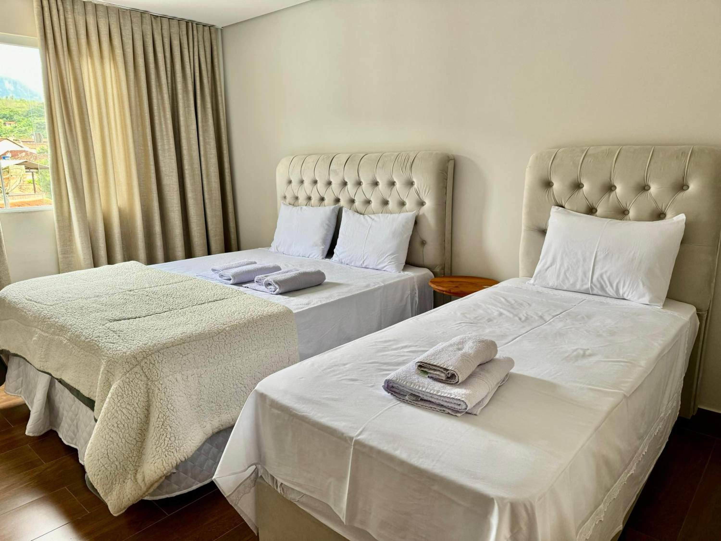 Apartamentos a 200m do centro - Hospedaria Villa da Pedra