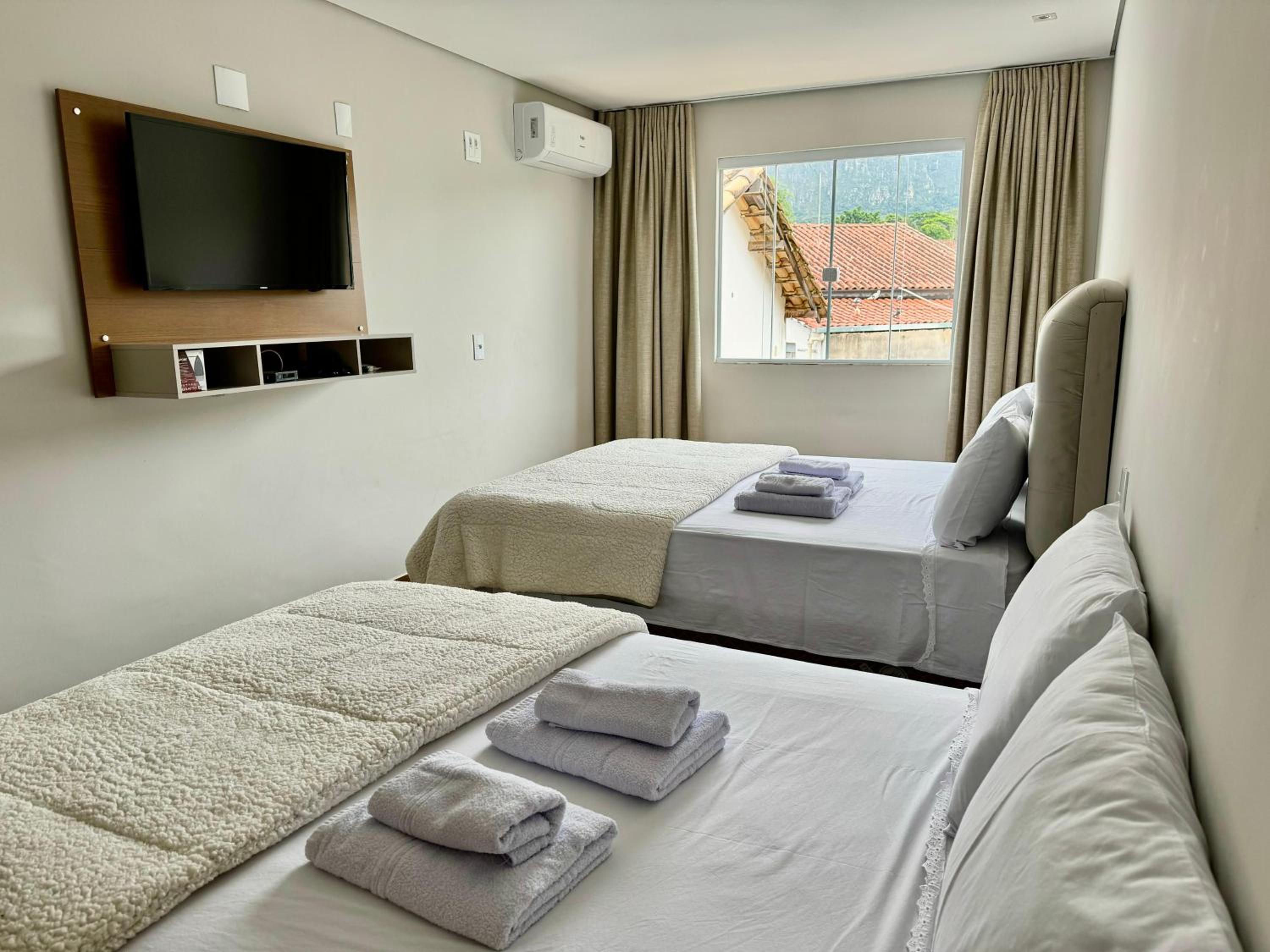 Apartamentos a 200m do centro - Hospedaria Villa da Pedra