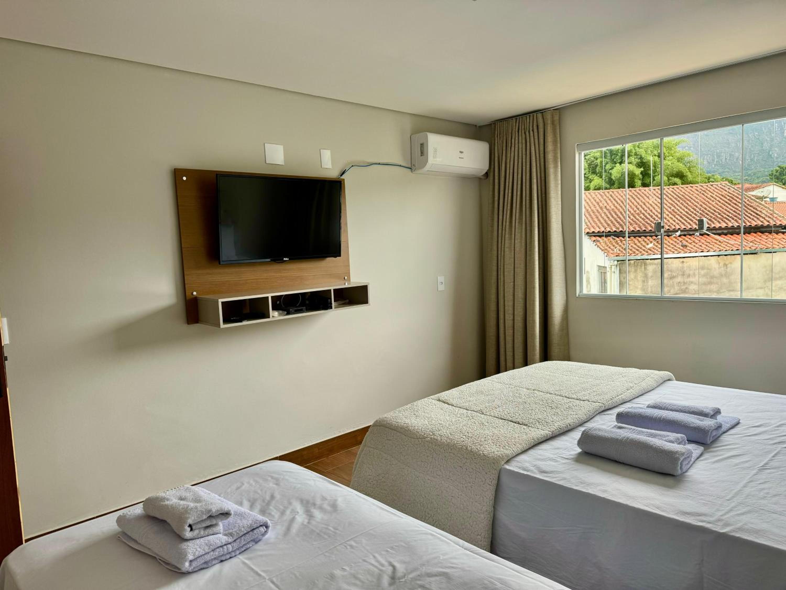 Apartamentos a 200m do centro - Hospedaria Villa da Pedra