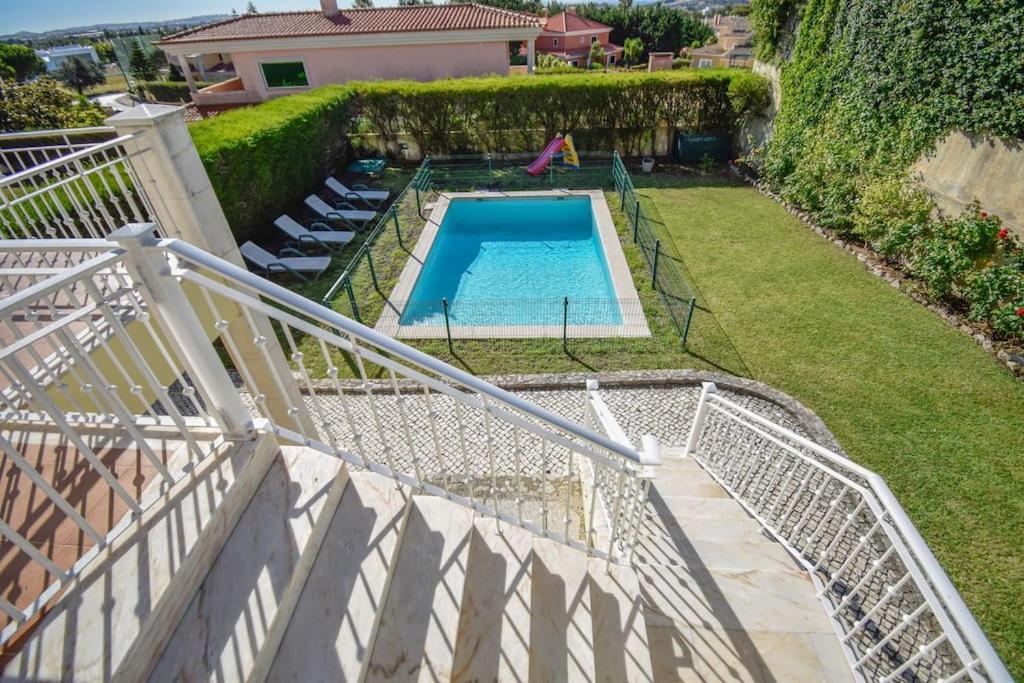 Spacious 4-Bedroom Villa with Private Heated Pool in Quinta da Beloura Sintra Ideal for Families & Long Stays view 2