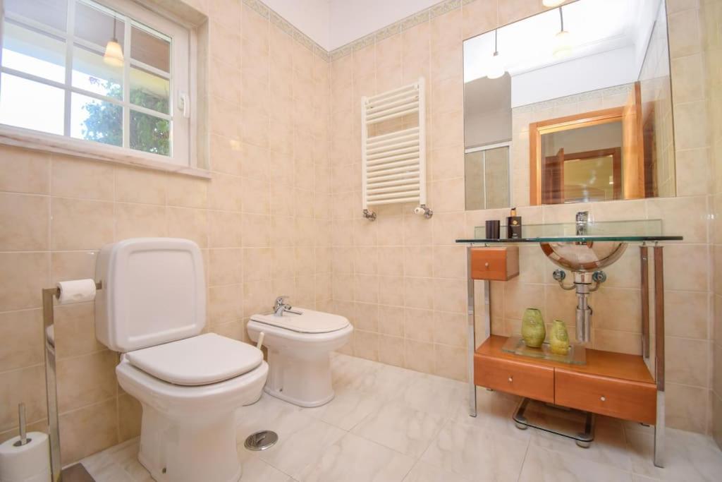 Spacious 4-Bedroom Villa with Private Heated Pool in Quinta da Beloura Sintra Ideal for Families & Long Stays view 4