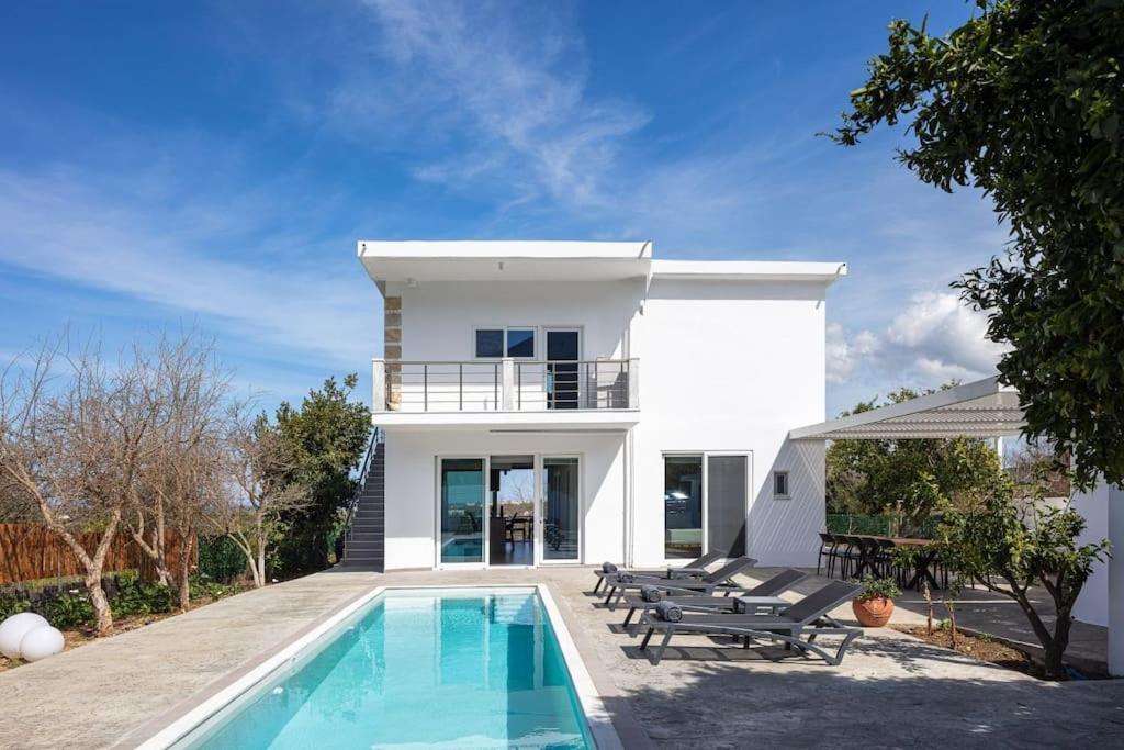 Cyan Viewpoint House near Lake Kourna view 3