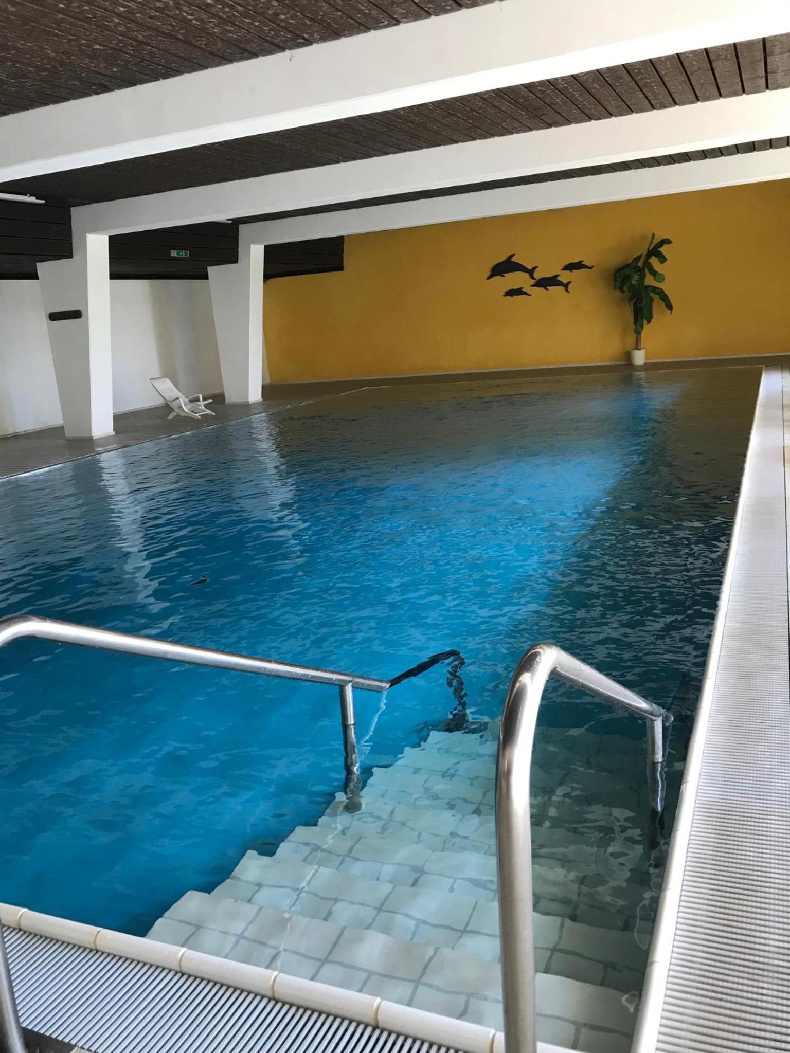 Ferienwohnung mit Schwimmbad und Gartenblick