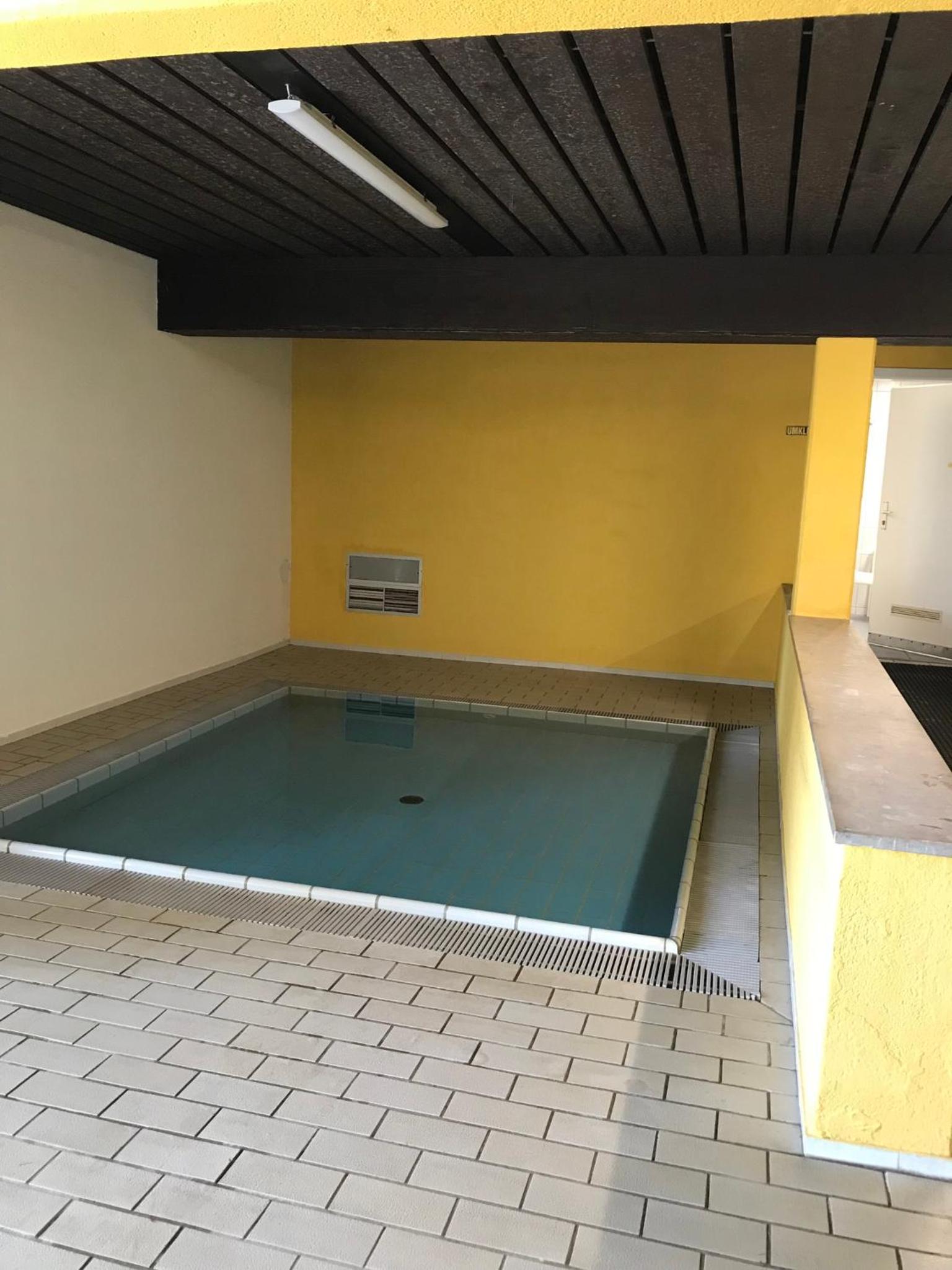 Ferienwohnung mit Schwimmbad und Gartenblick