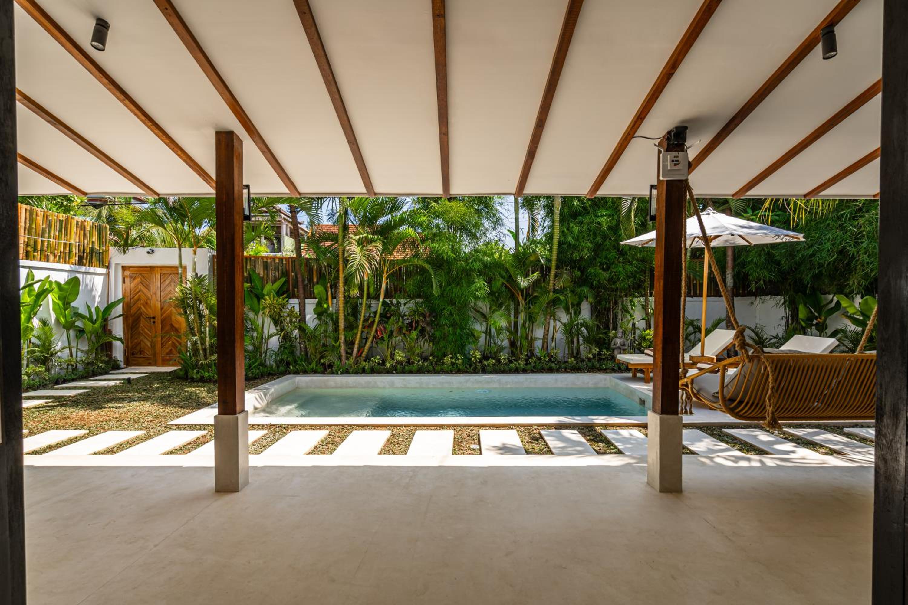 Udara by EVDEkimi - Spacious 4BR Pool villa with Lush garden at Artistic Center of Ubud view 3