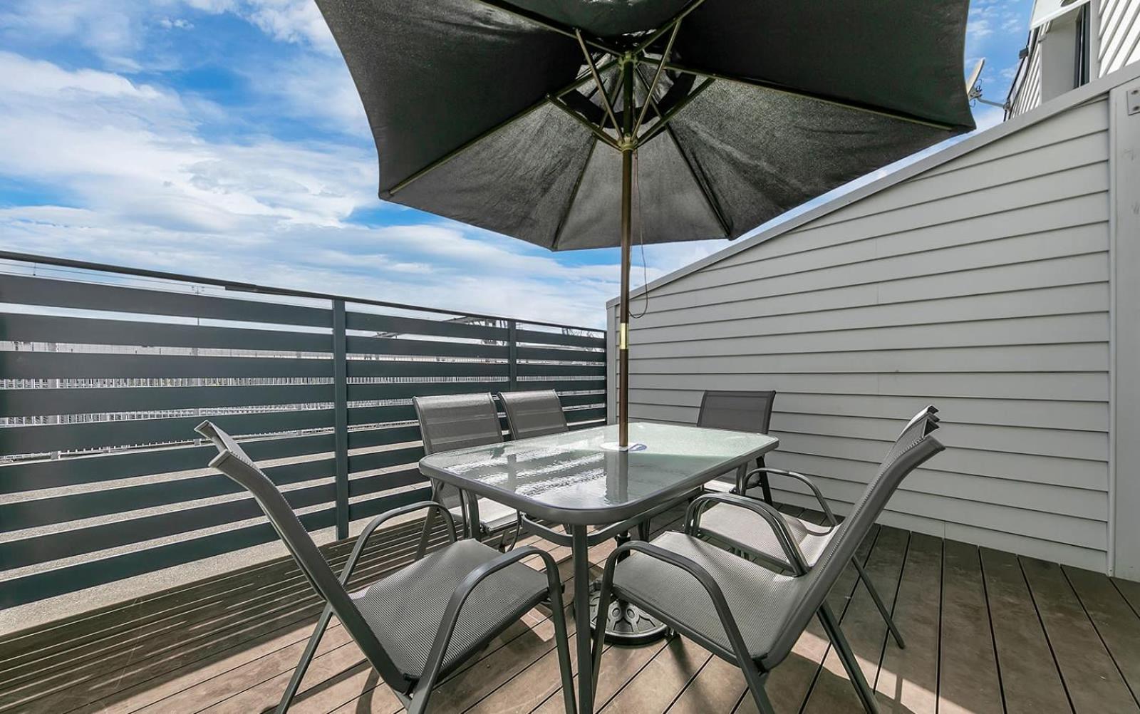 Balcony and Parking 3BR Gem Near Arena by Zodiak Stays view 3