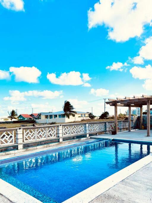 Serenity by the Sea: Ocean Front Villa with Pool