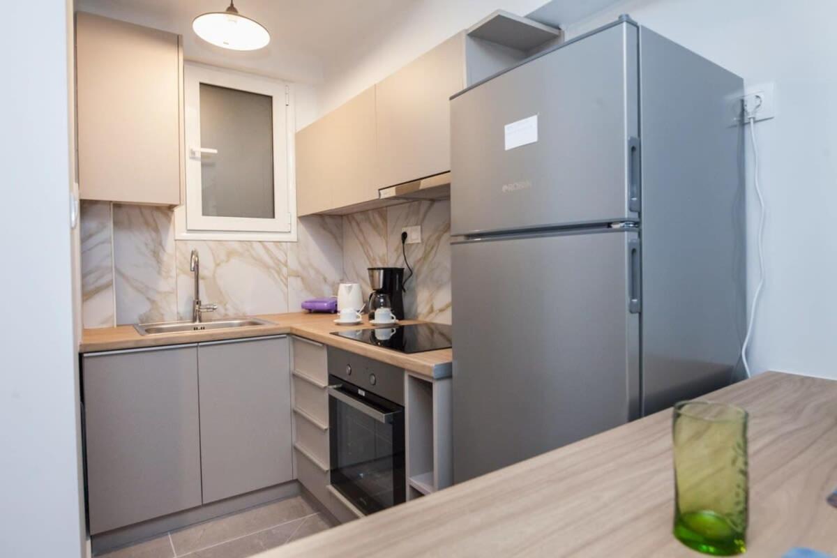 Charming Urban Oasis 1BR Apt near Megaro Mousikis