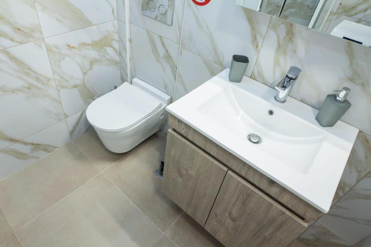 Charming Urban Oasis 1BR Apt near Megaro Mousikis