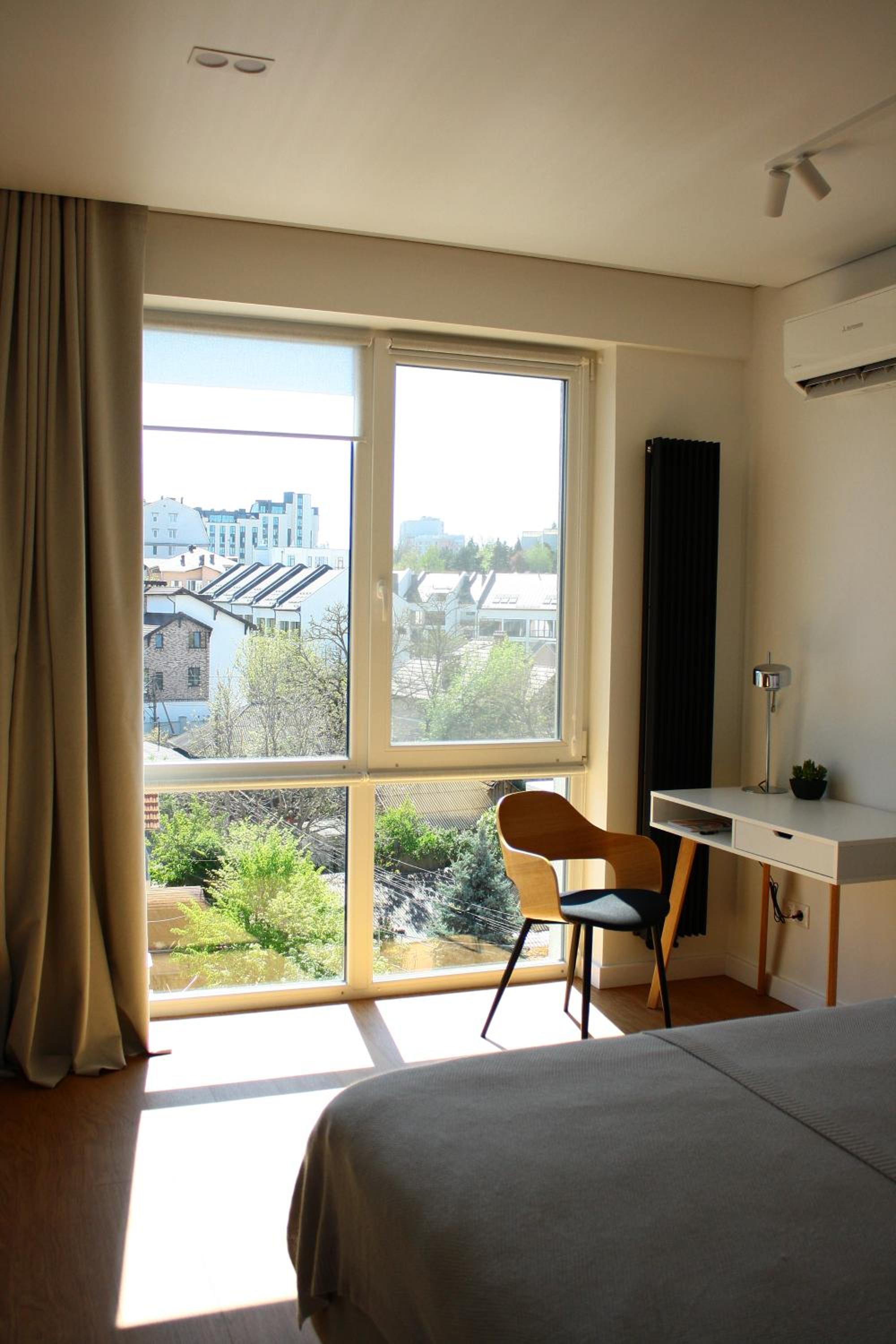 Your Home in Chisinau: Private Parking and Peaceful Stay view 3