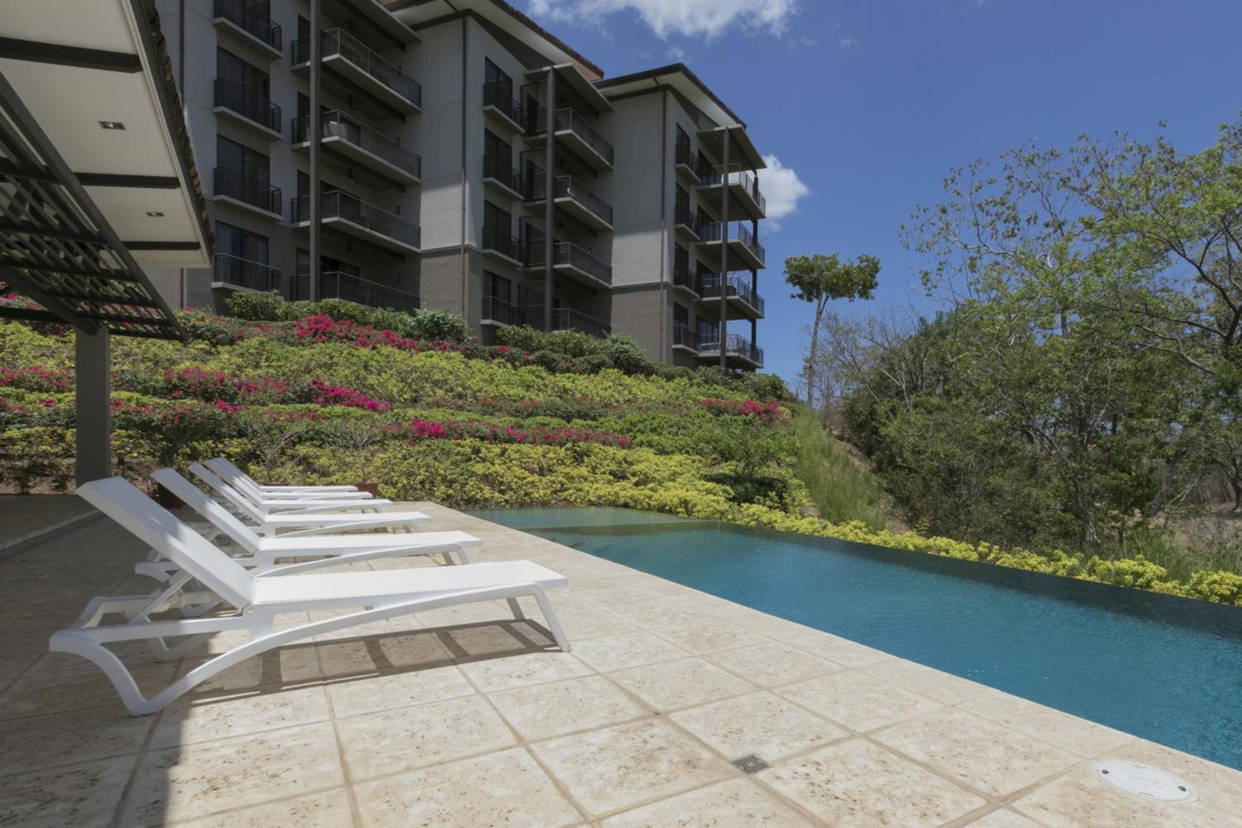 Modern 2BR Condo Partial Ocean View - Roble Sabana - Reserva Conchal Golf Resort