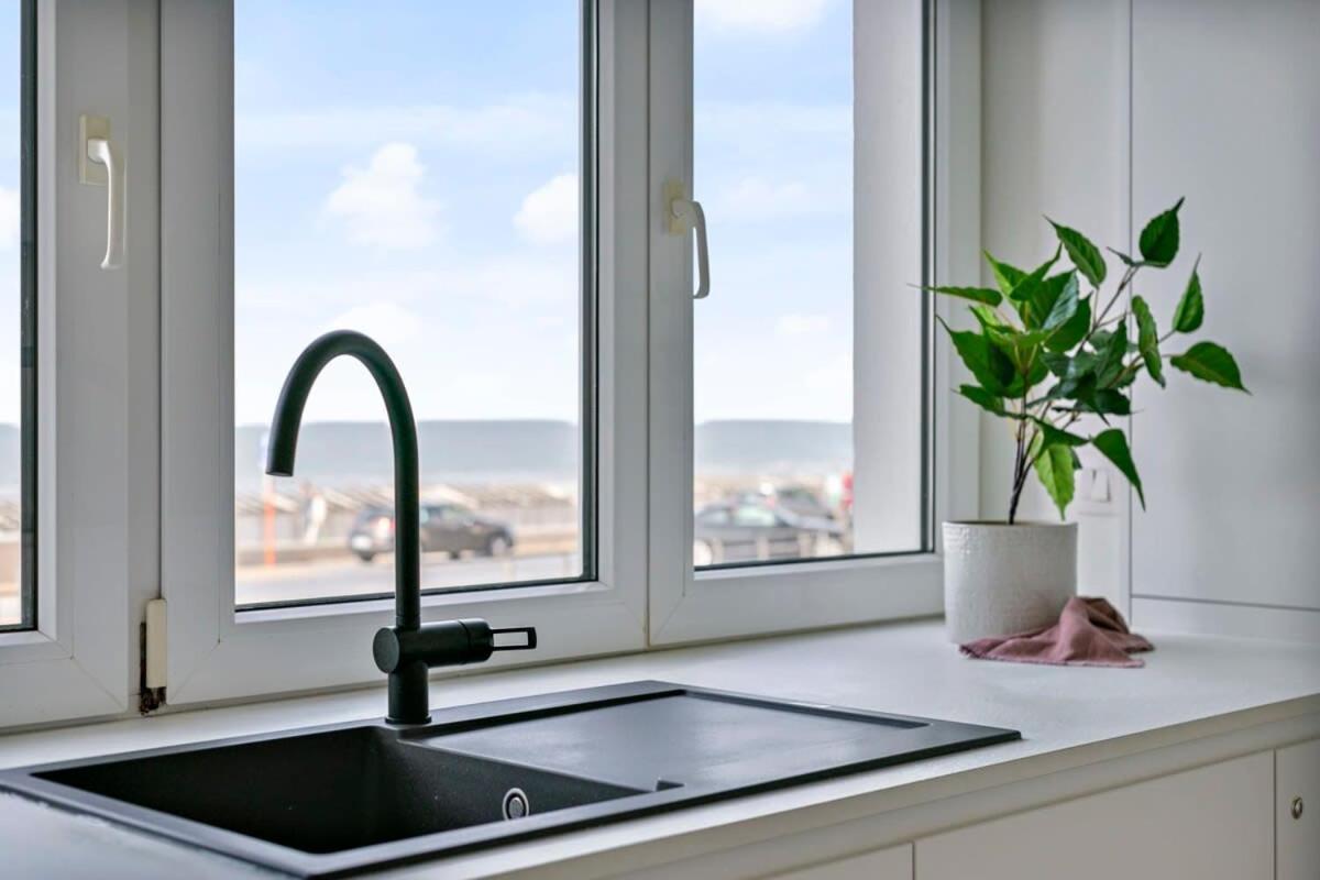Stylishly refurbished family apartment with stunning sea view