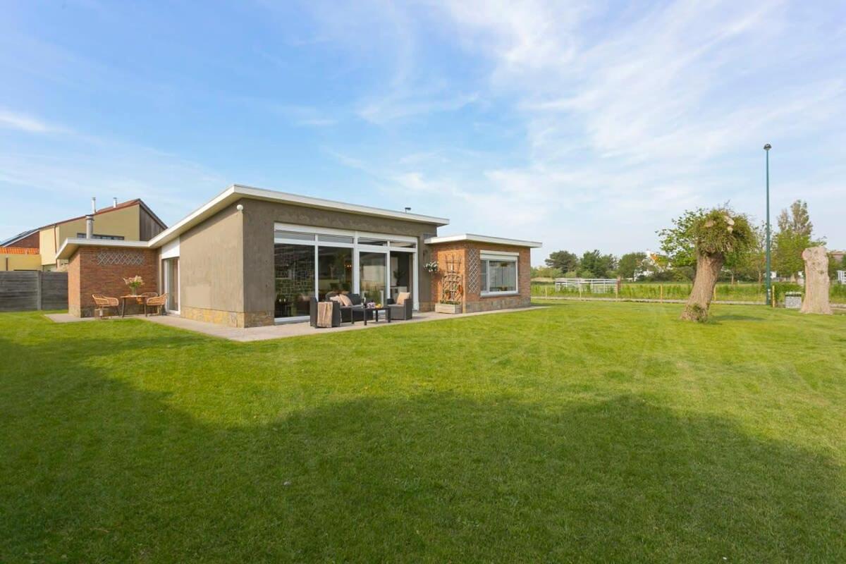 Rural bungalow with delightful garden at only 5 minutes from De Haan beach