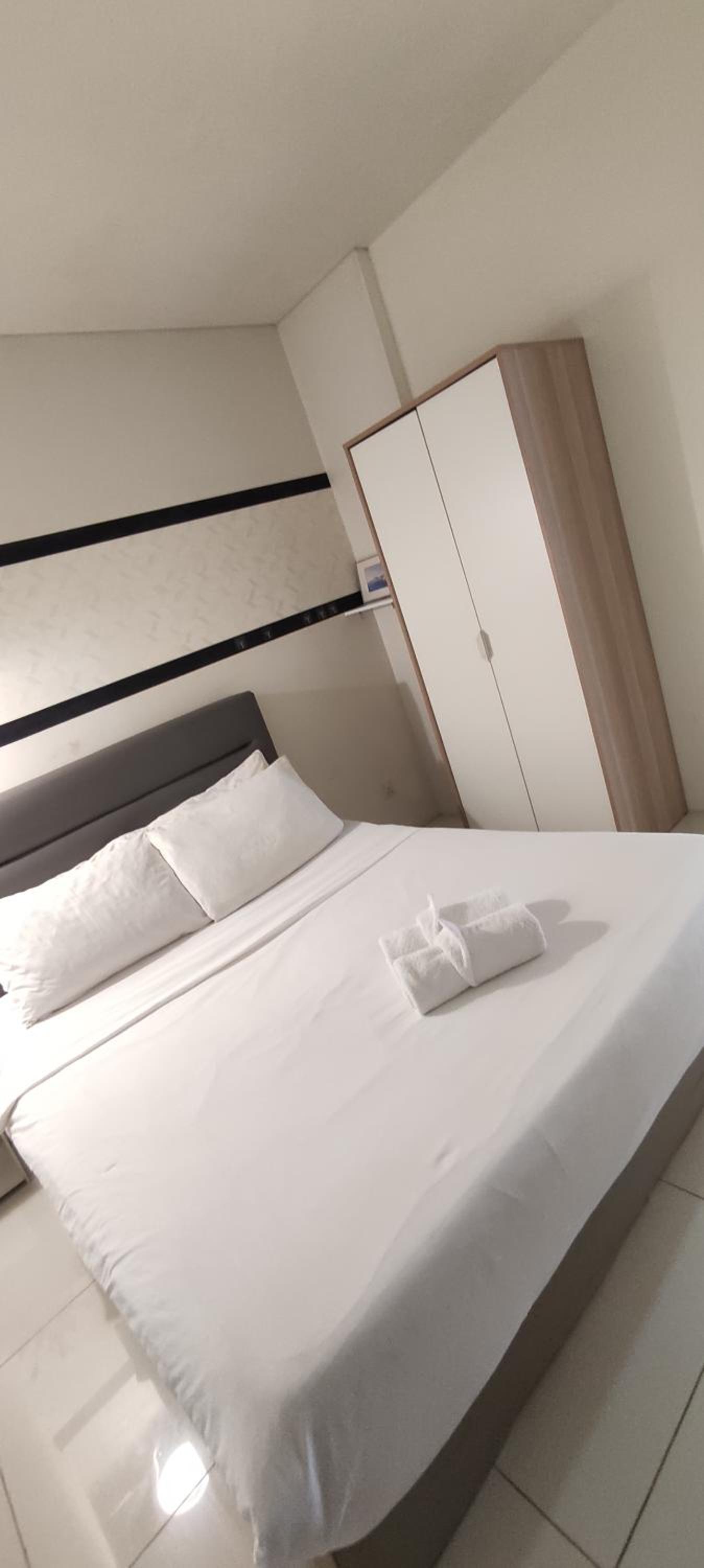 Mercu Summer Suites by Cozy place