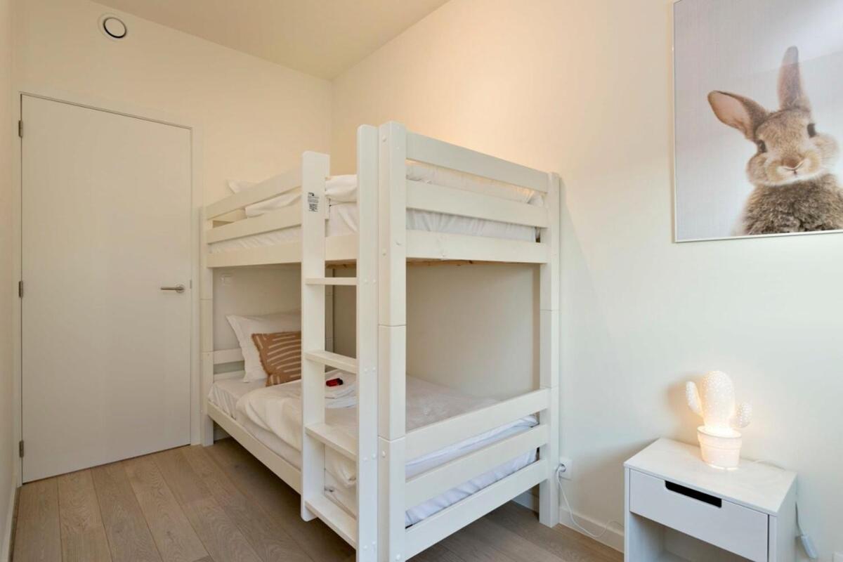 Luxurious new town-house at 100 meters from beach in prestigious O'Sea-project