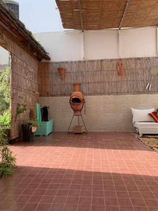 Appartement au RDC d'une Maison
