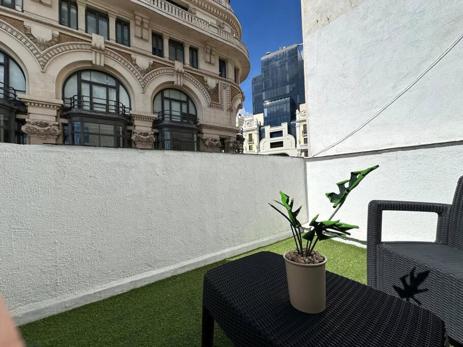 Cozy penthouse with terrace in Gran Via - 3C view 3