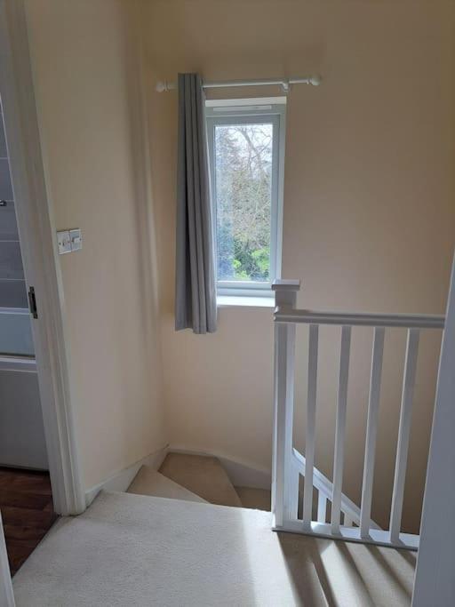 Vibrant Coastal Village Retreat- private parking view 4