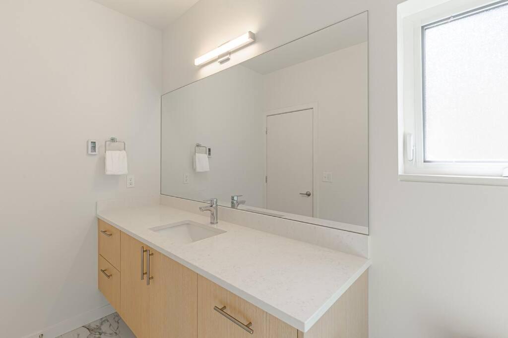 Sunny Modern Masterpiece with EV Charging and A/C view 4