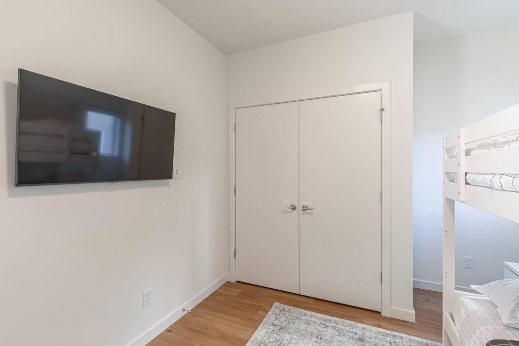 Sunny Modern Masterpiece with EV Charging and A/C view 5