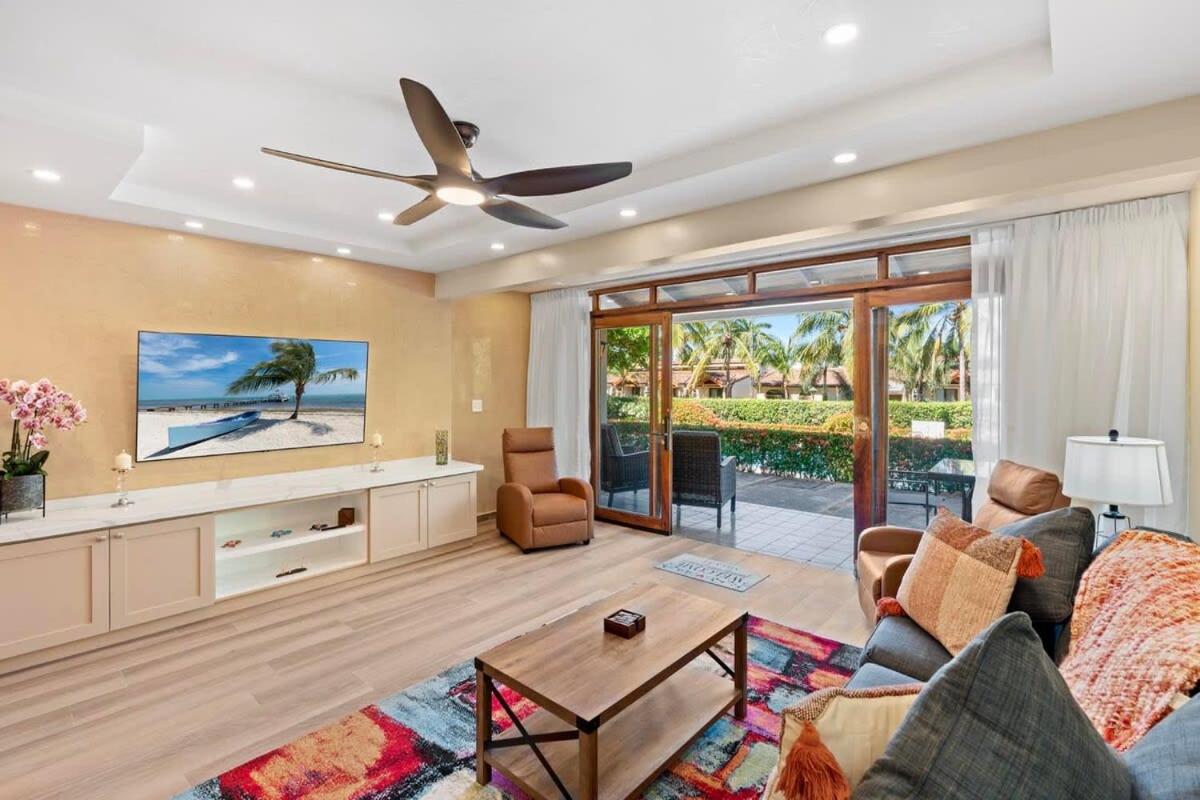 Stylish 2-Bedroom Beach Condo with Ocean-View Deck, Lush Pool Area & 2-Minute Walk to Flamingo Beach