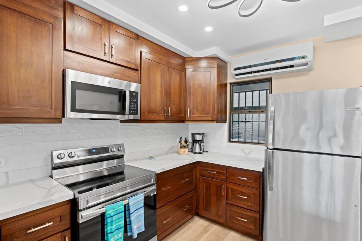 Stylish 2-Bedroom Beach Condo with Ocean-View Deck, Lush Pool Area & 2-Minute Walk to Flamingo Beach