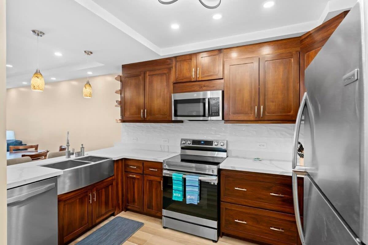 Stylish 2-Bedroom Beach Condo with Ocean-View Deck, Lush Pool Area & 2-Minute Walk to Flamingo Beach