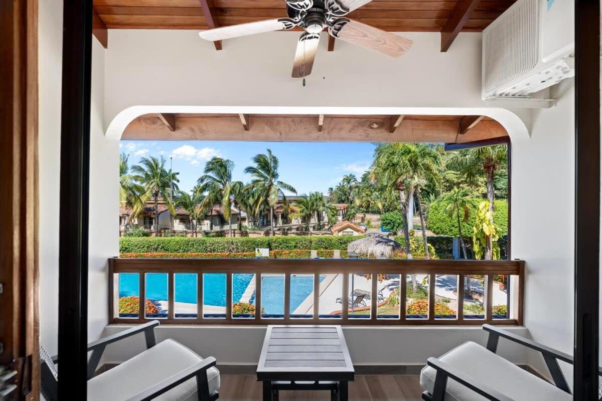 Stylish 2-Bedroom Beach Condo with Ocean-View Deck, Lush Pool Area & 2-Minute Walk to Flamingo Beach