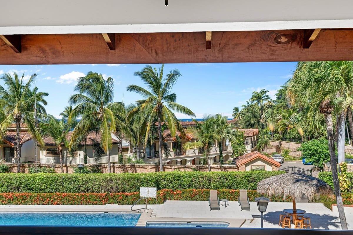 Stylish 2-Bedroom Beach Condo with Ocean-View Deck, Lush Pool Area & 2-Minute Walk to Flamingo Beach