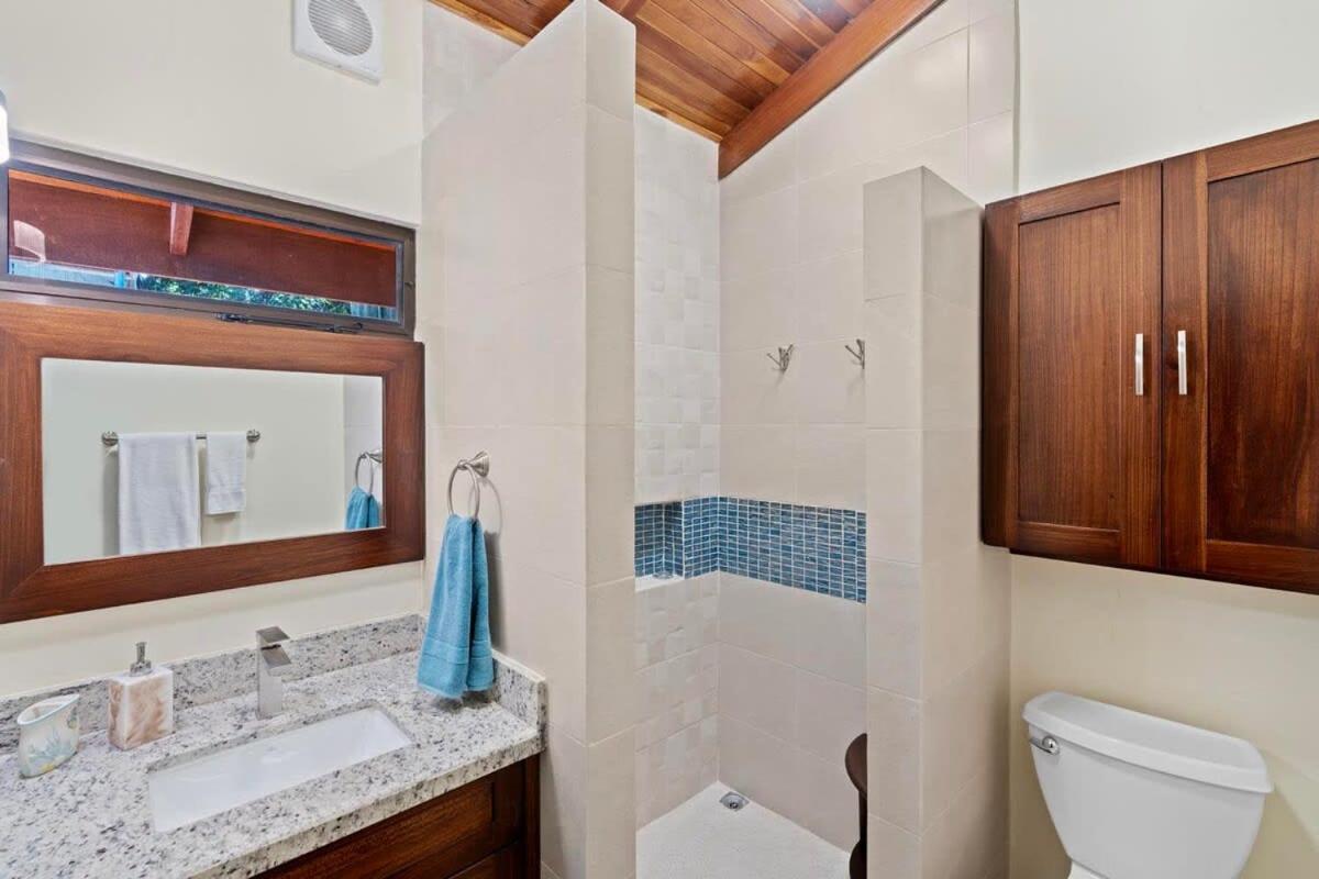 Stylish 2-Bedroom Beach Condo with Ocean-View Deck, Lush Pool Area & 2-Minute Walk to Flamingo Beach