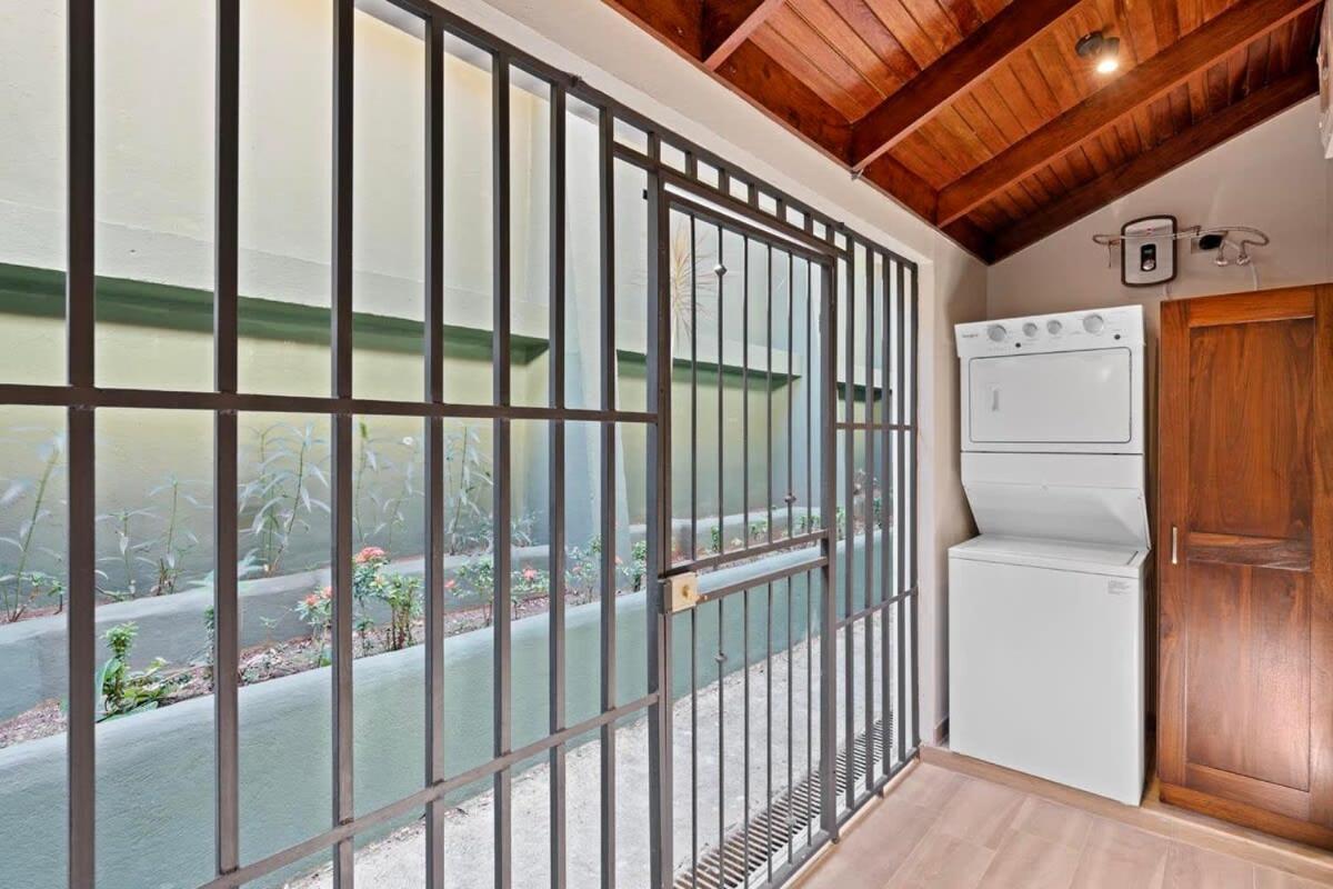 Stylish 2-Bedroom Beach Condo with Ocean-View Deck, Lush Pool Area & 2-Minute Walk to Flamingo Beach