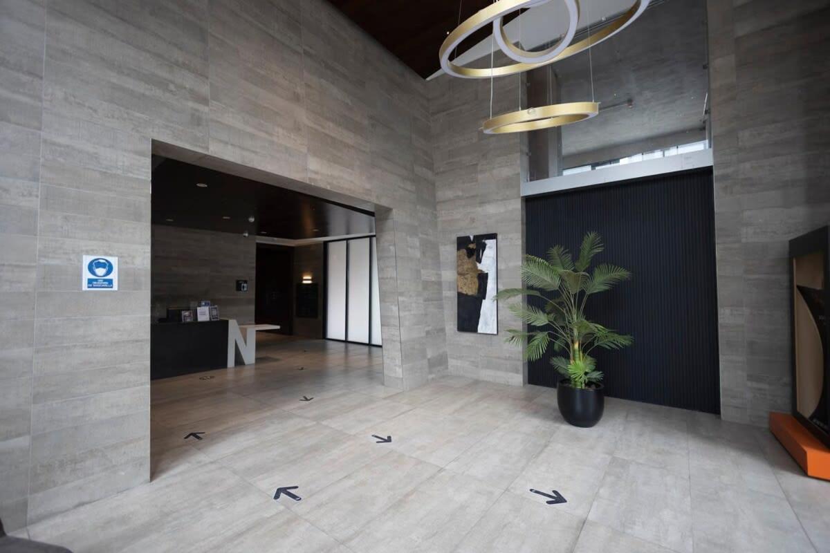 Cozy apartment steps away from Costanera Center
