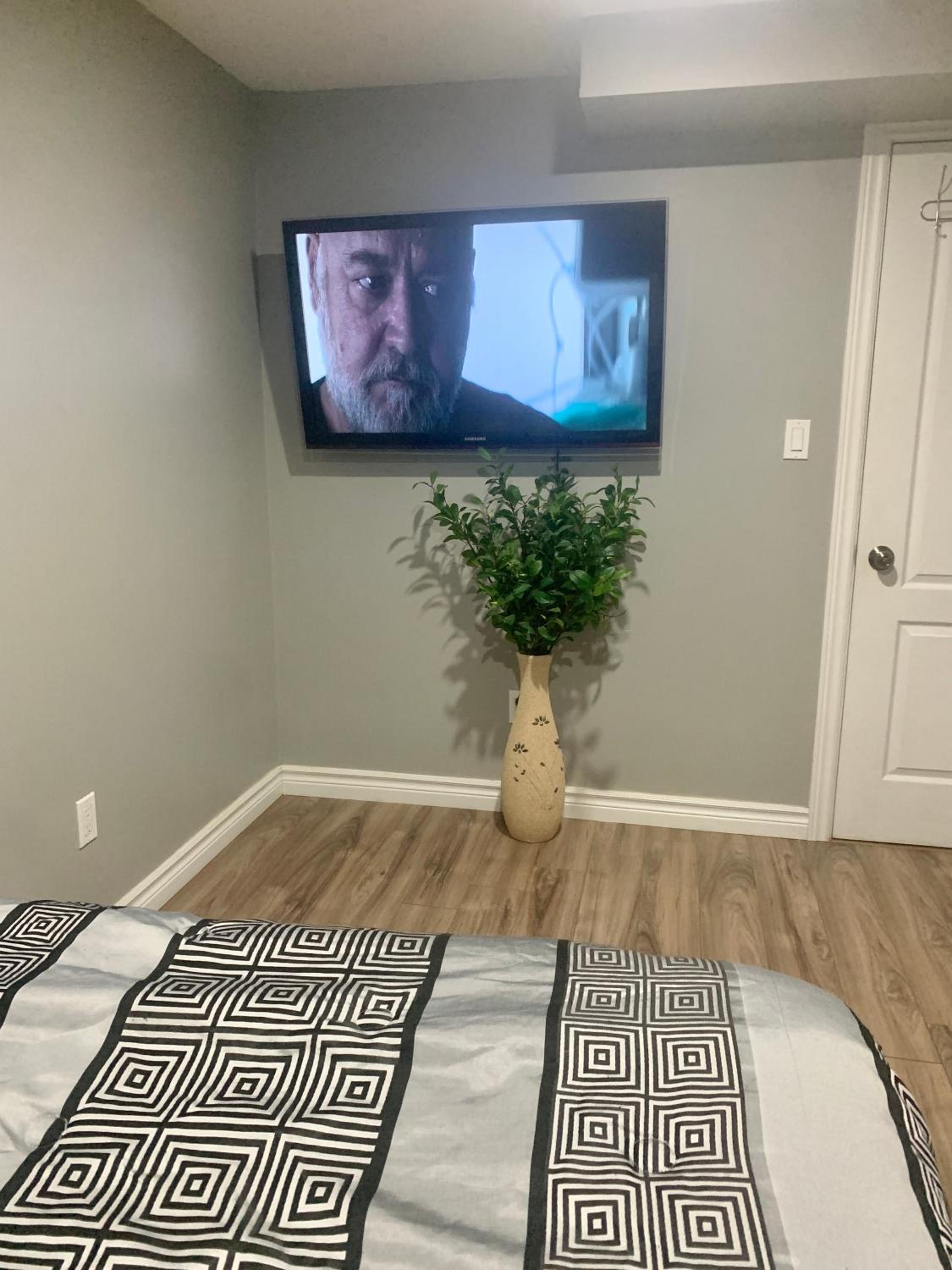 Guelph Vacations - A bedroom in a basement - Property Image 6