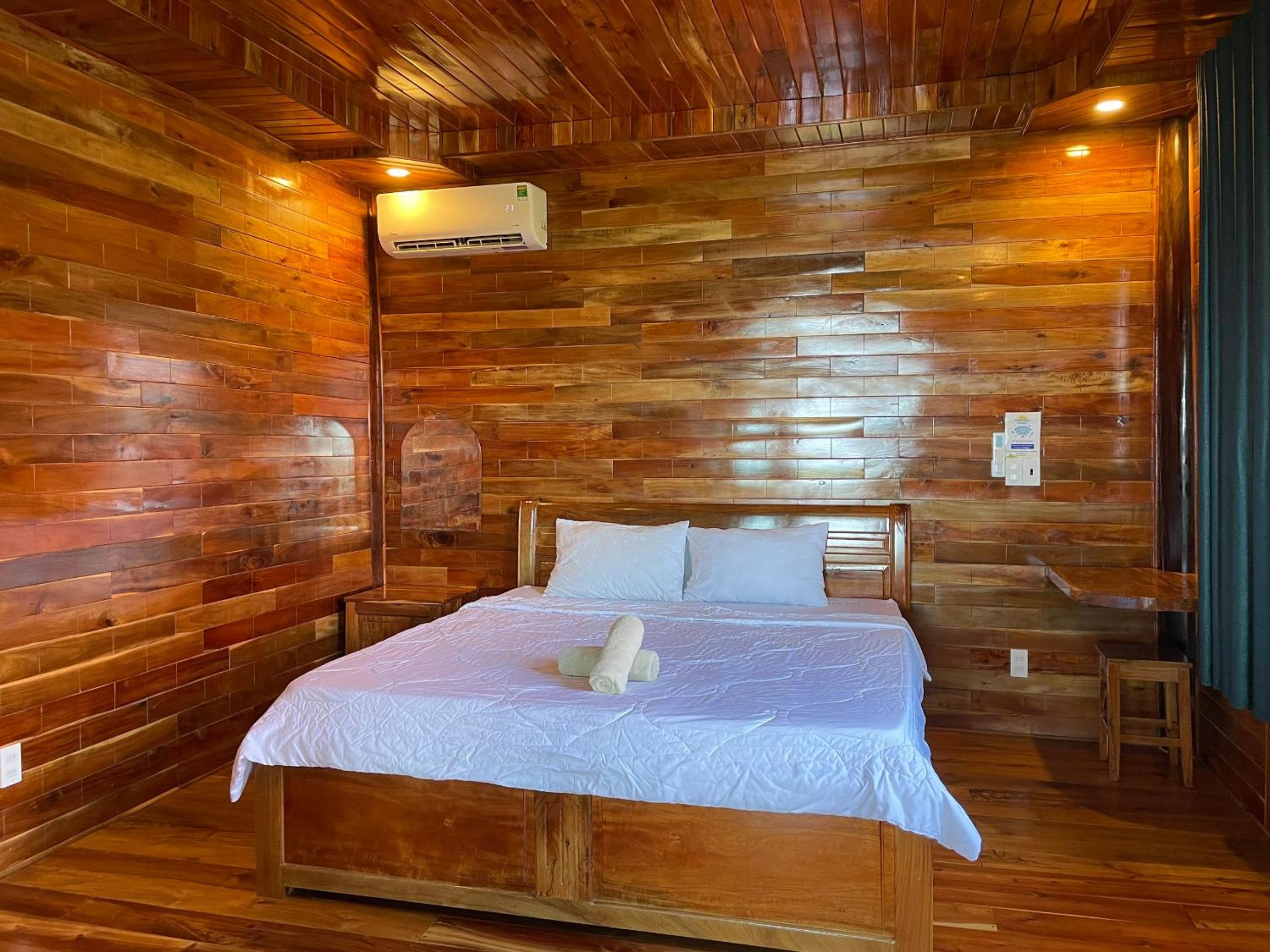 Amazing sunrise over wooden house at the East
